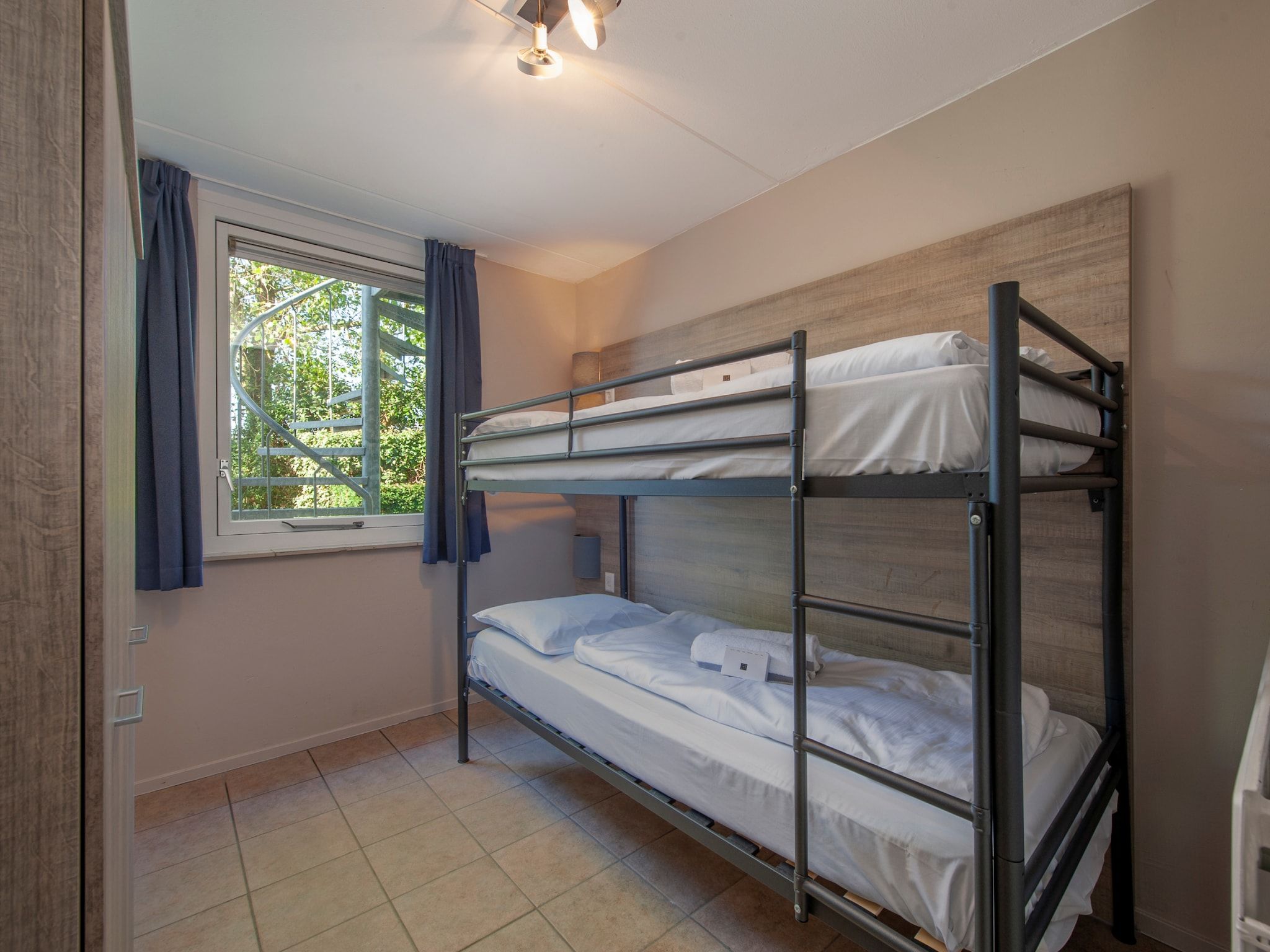 Een slaapkamer van Roompot Beach Resort 11 in Kamperland