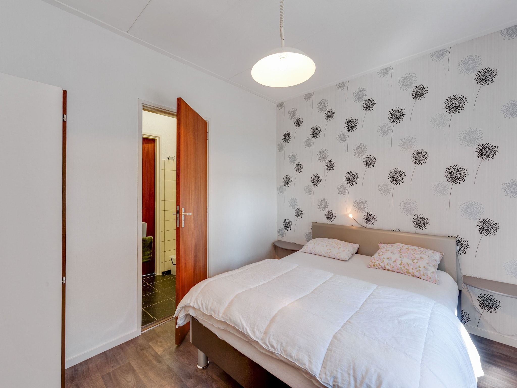 Een slaapkamer van De Drentsche Patrijs in Mantinge