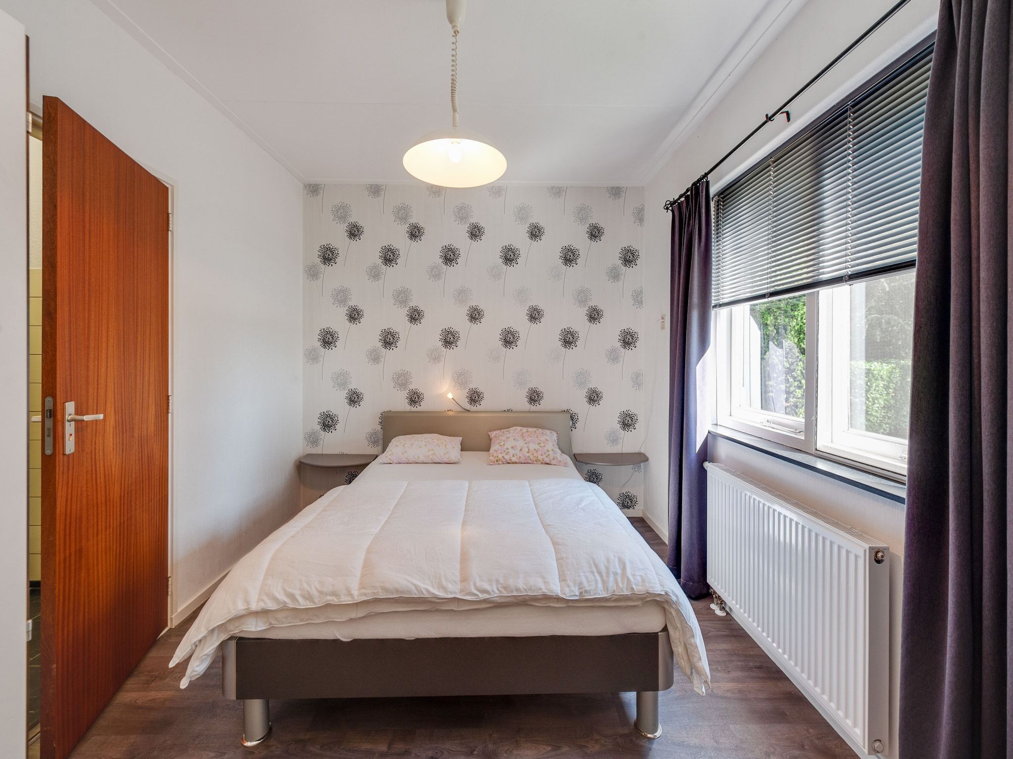 Een slaapkamer van De Drentsche Patrijs in Mantinge