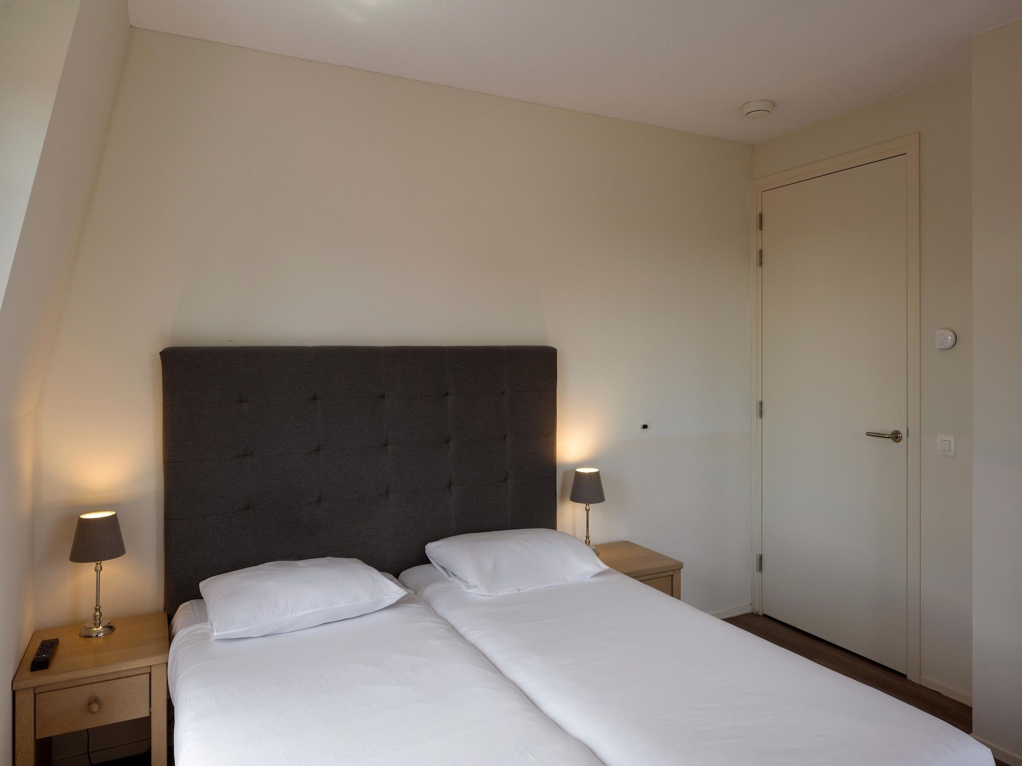 Een slaapkamer van Résidence Wijngaerde 3 in Domburg