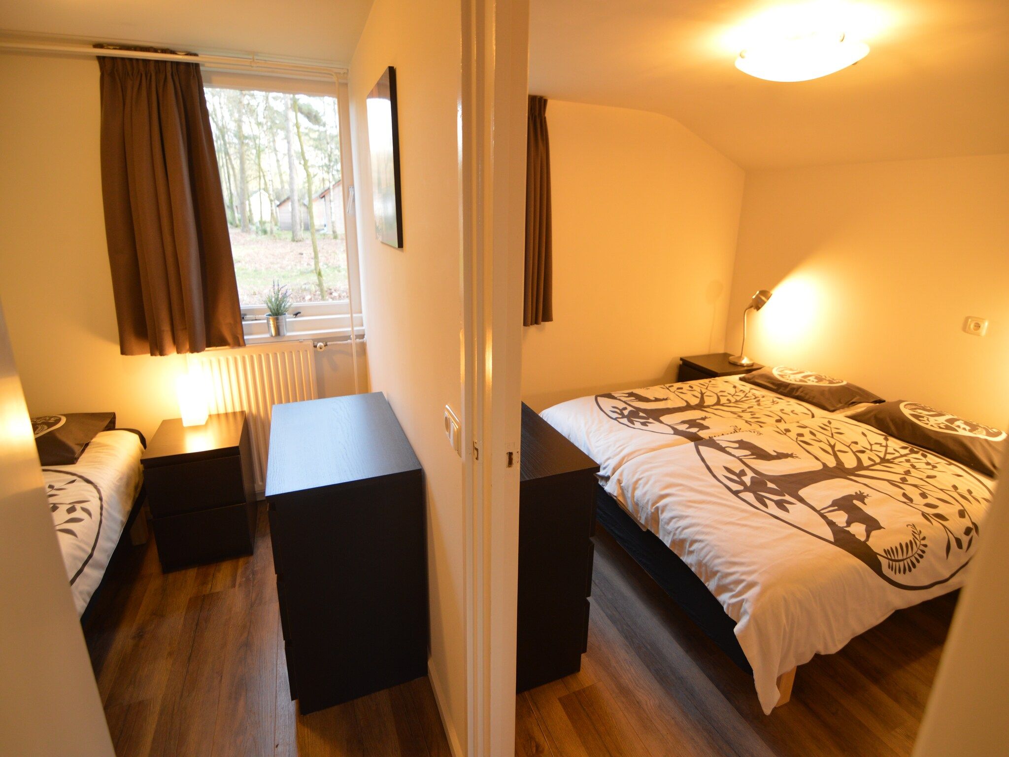 Een slaapkamer van Bungalow 27 in Stramproy