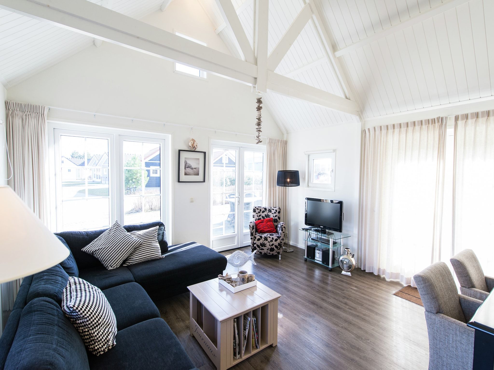 De woonkamer van Vakantiepark Boomhiemke 3 in Hollum