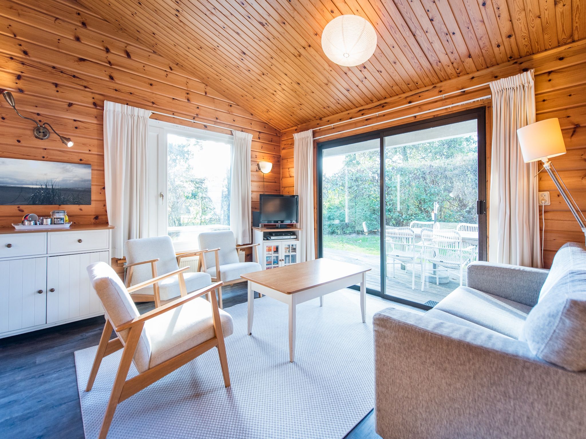 De woonkamer van Vakantiepark Boomhiemke 10 in Hollum