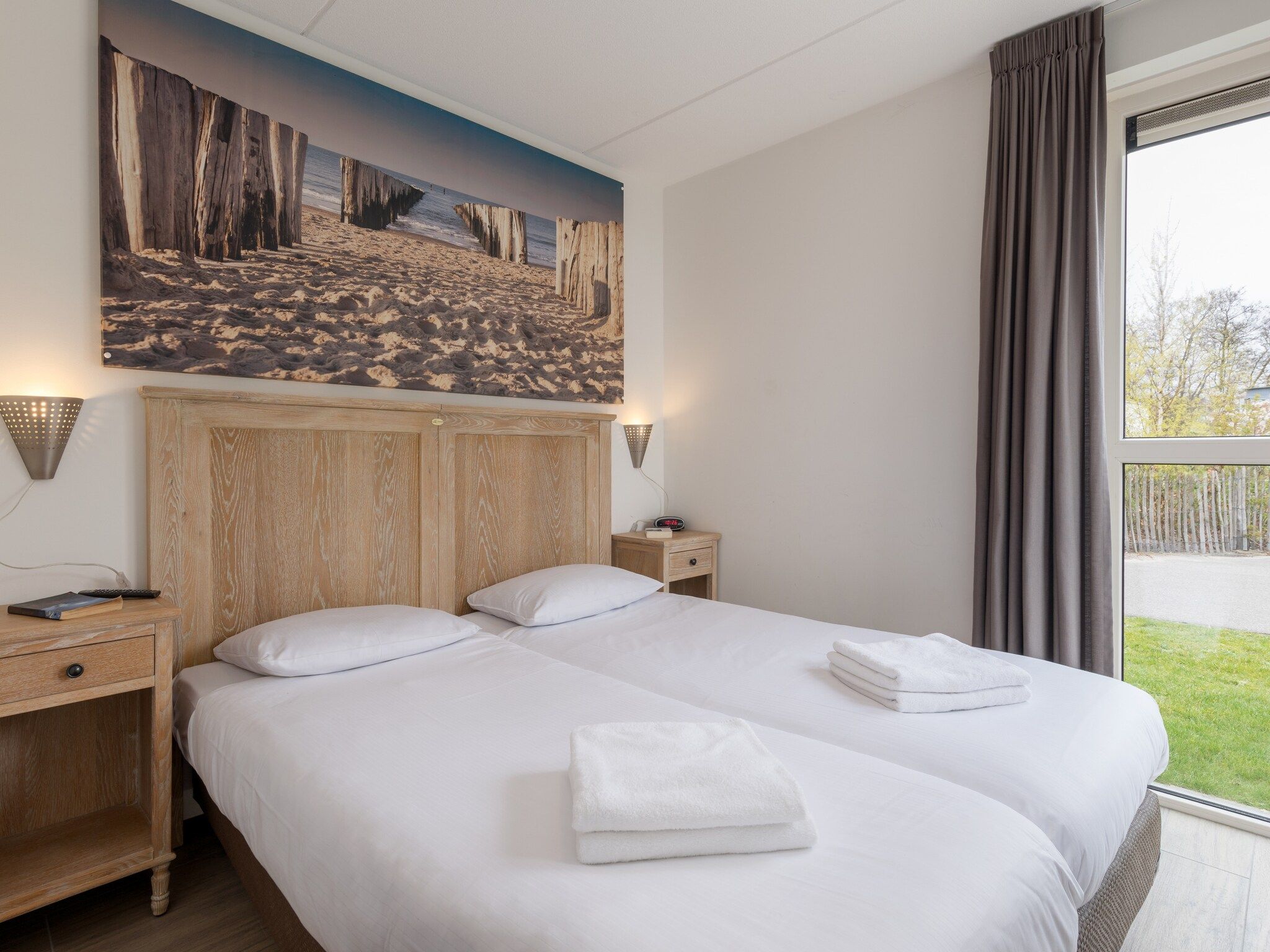 Een slaapkamer van Kustpark Texel 4 in De Koog