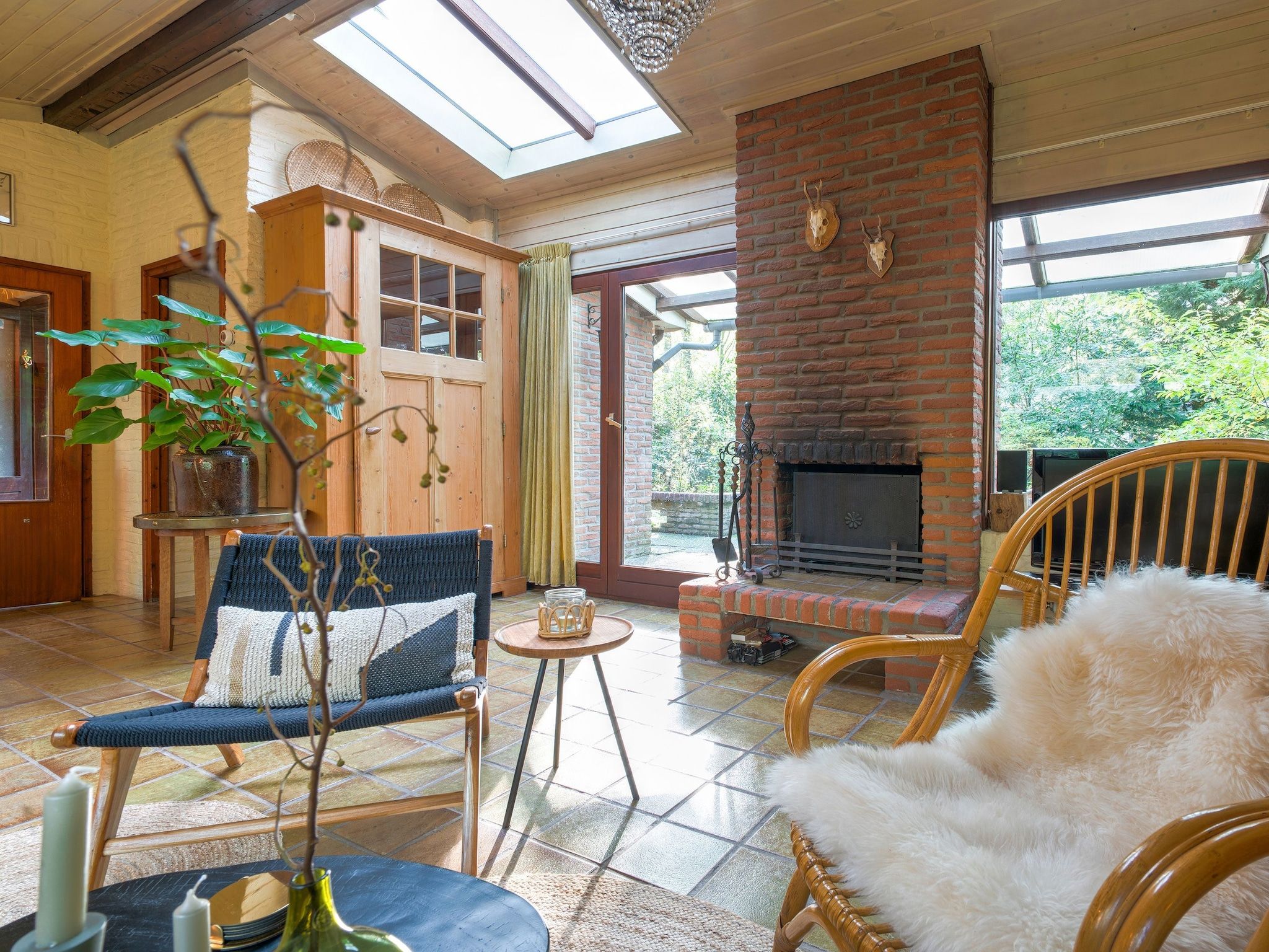 De woonkamer van The Forest Cottage in Zorgvlied