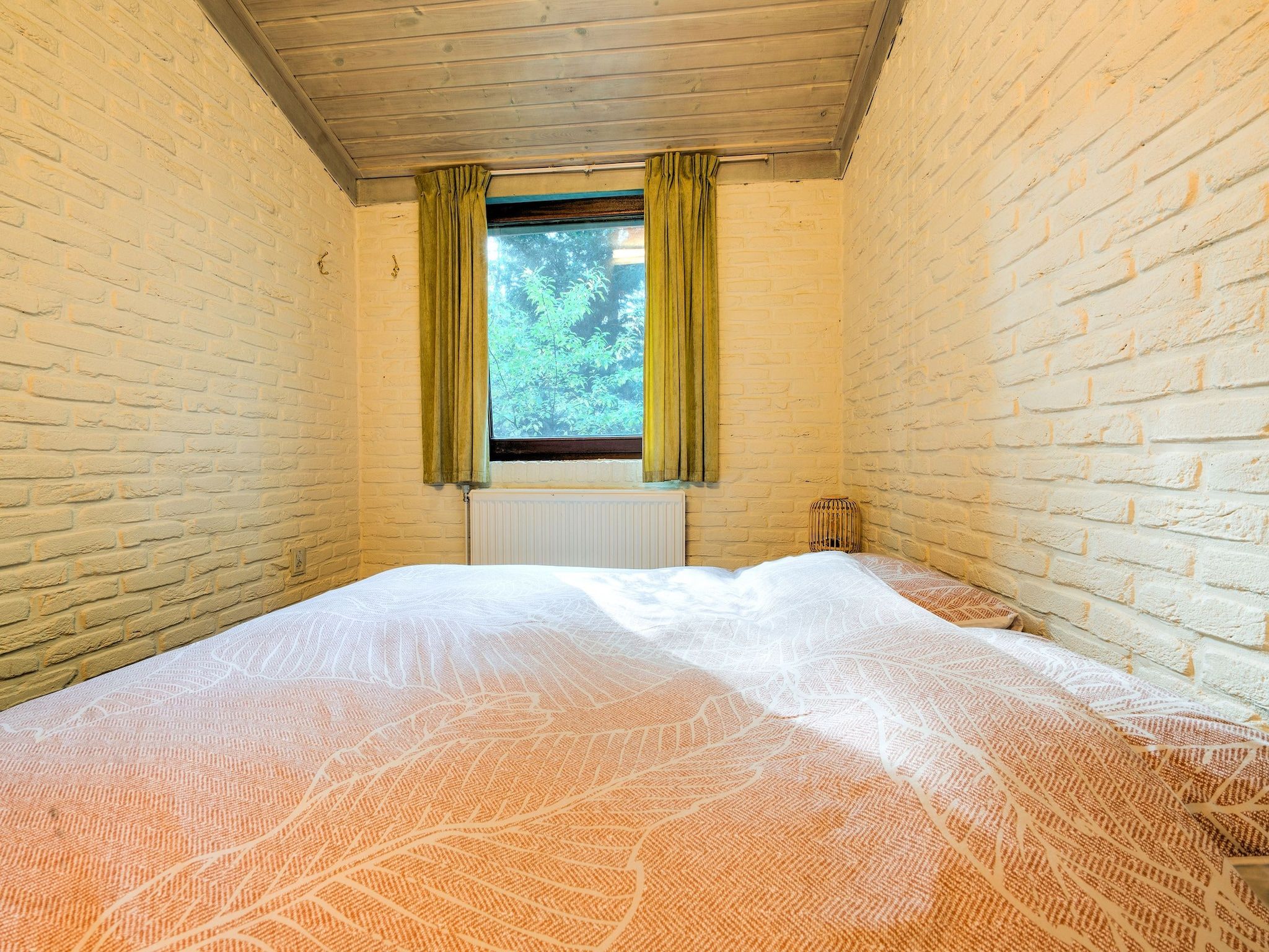 Een slaapkamer van The Forest Cottage in Zorgvlied