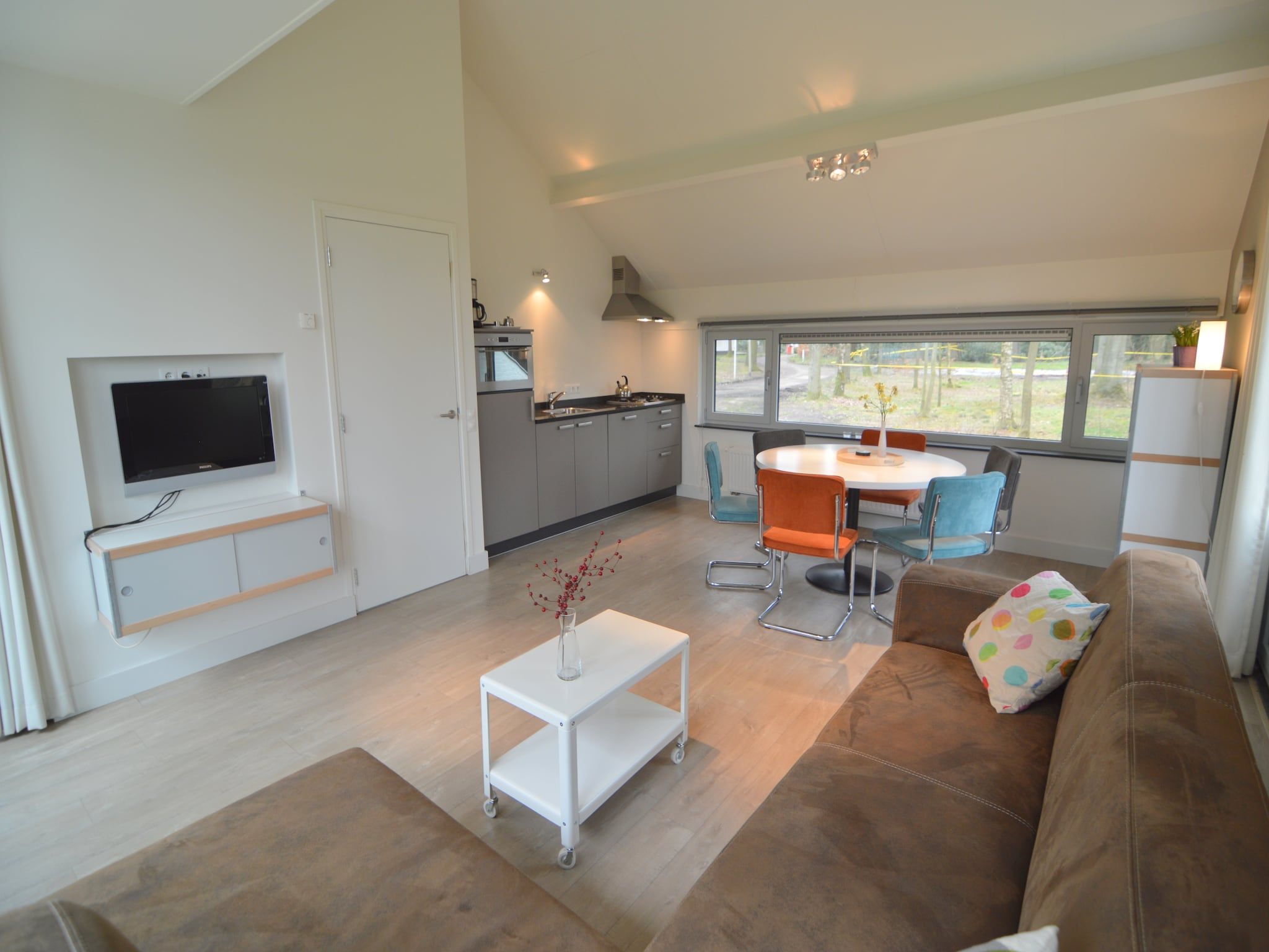 De woonkamer van Bungalow 5 in Stramproy