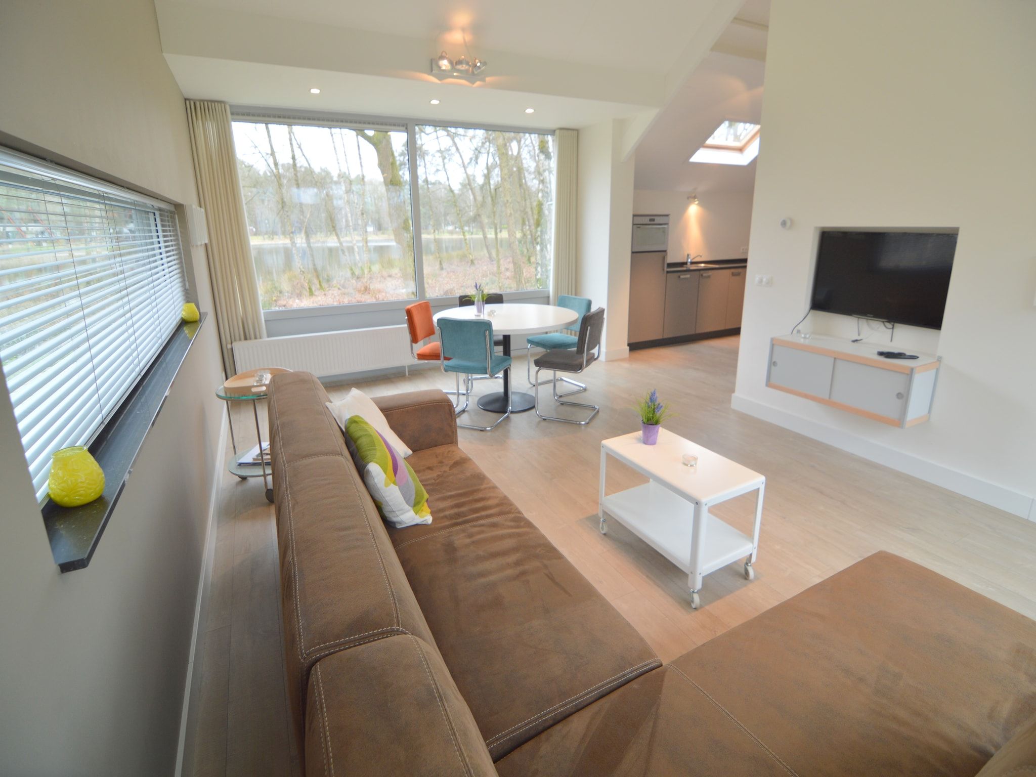 De woonkamer van Bungalow 4 in Stramproy