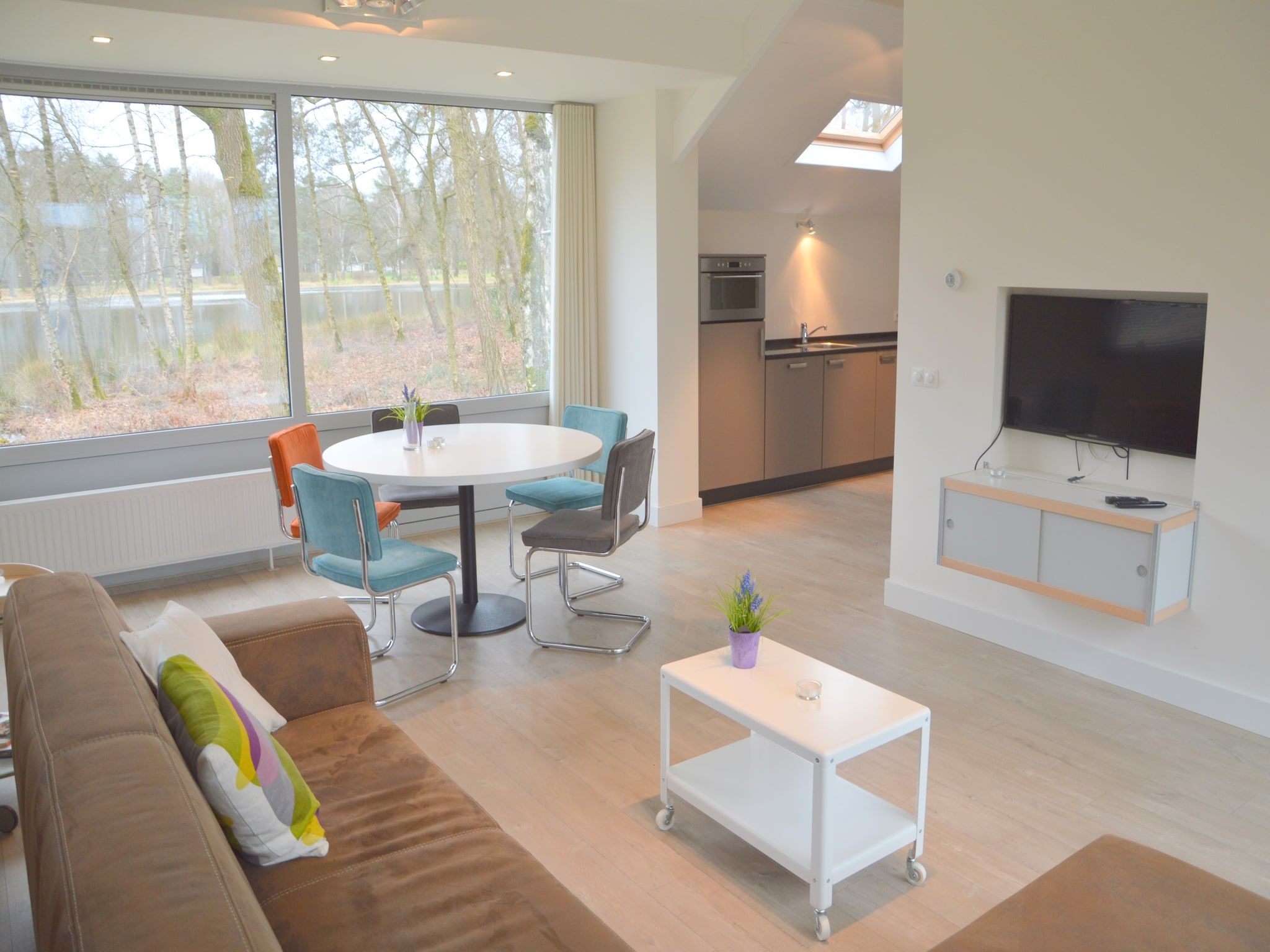 De woonkamer van Bungalow 4 in Stramproy