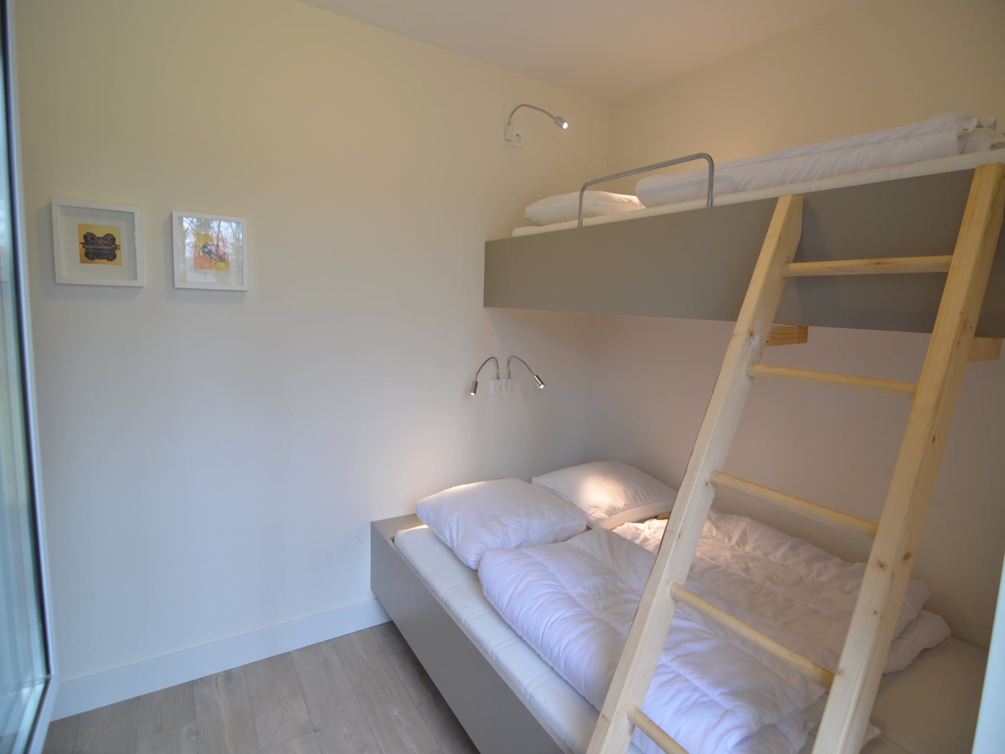 Een slaapkamer van Bungalow 4 in Stramproy