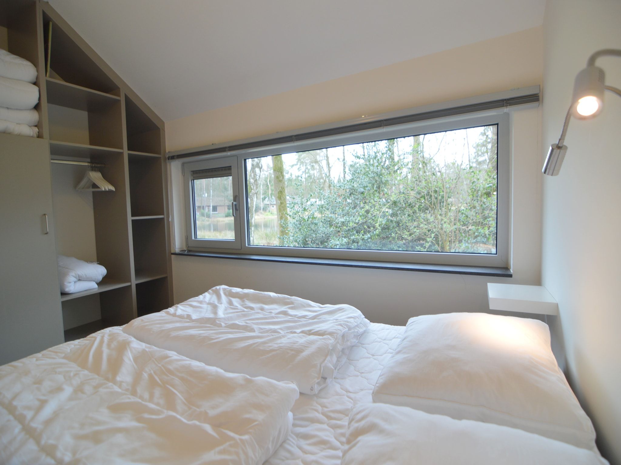 Een slaapkamer van Bungalow 4 in Stramproy