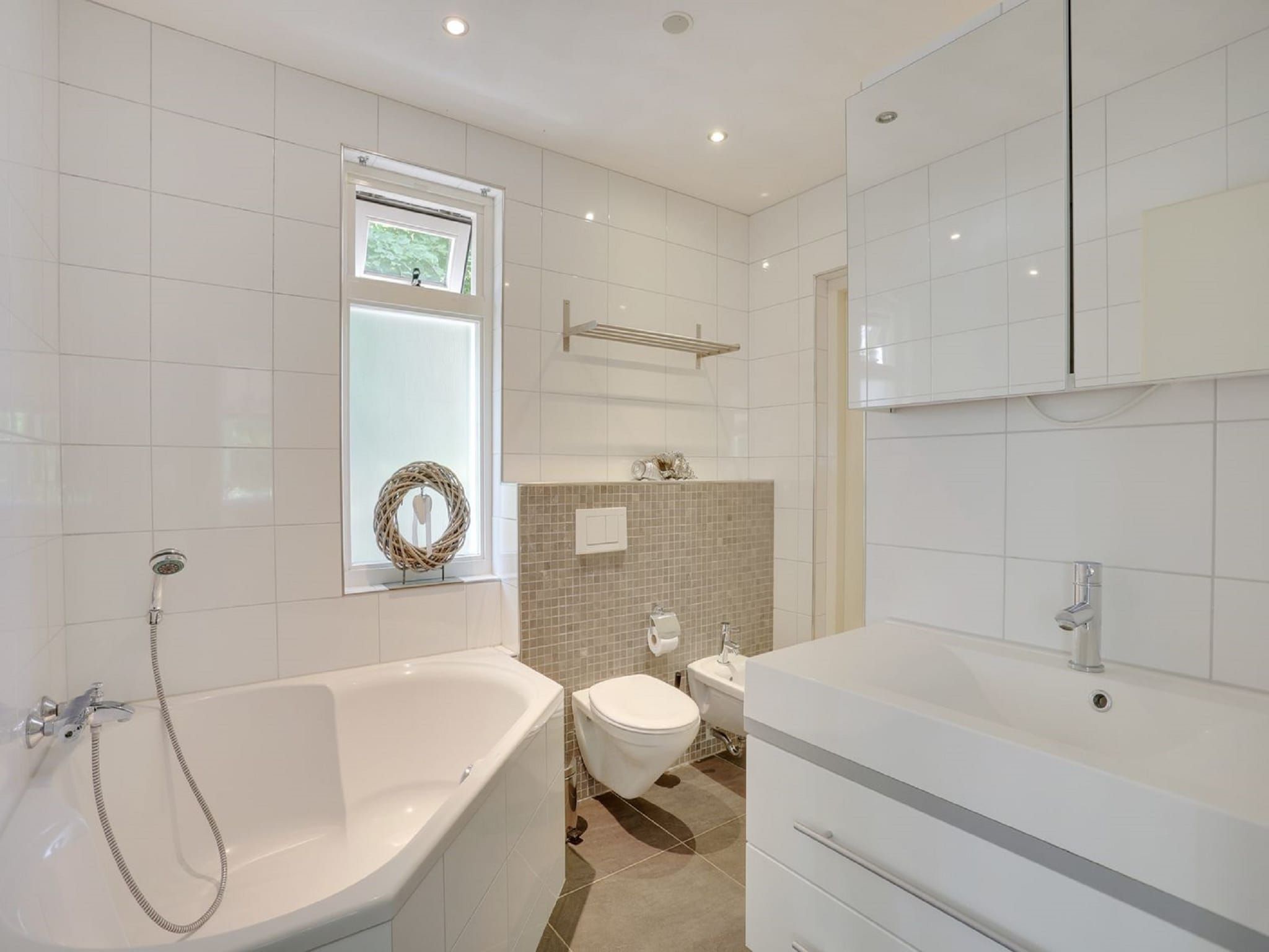 De badkamer van Vakantiepark Sandberghe 2 in Uden