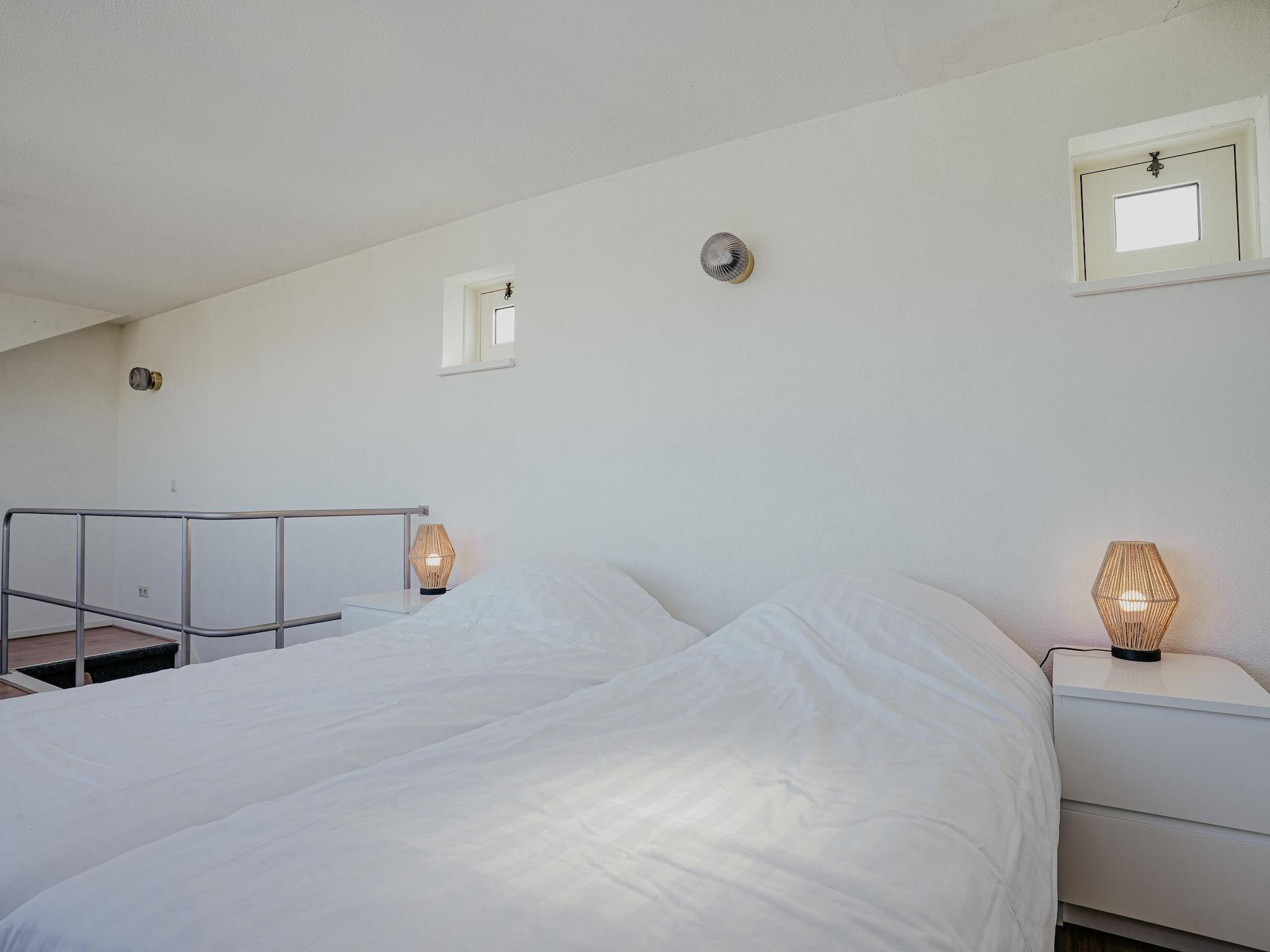 Een slaapkamer van Waterpark de Meerparel 2 in Uitgeest