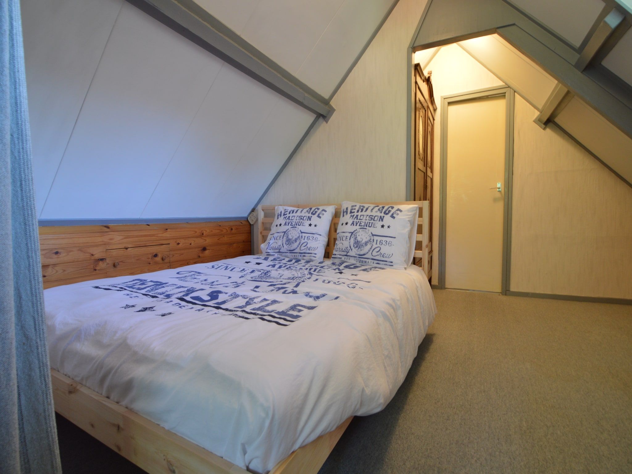 Een slaapkamer van Little White Cottage in Nijeberkoop