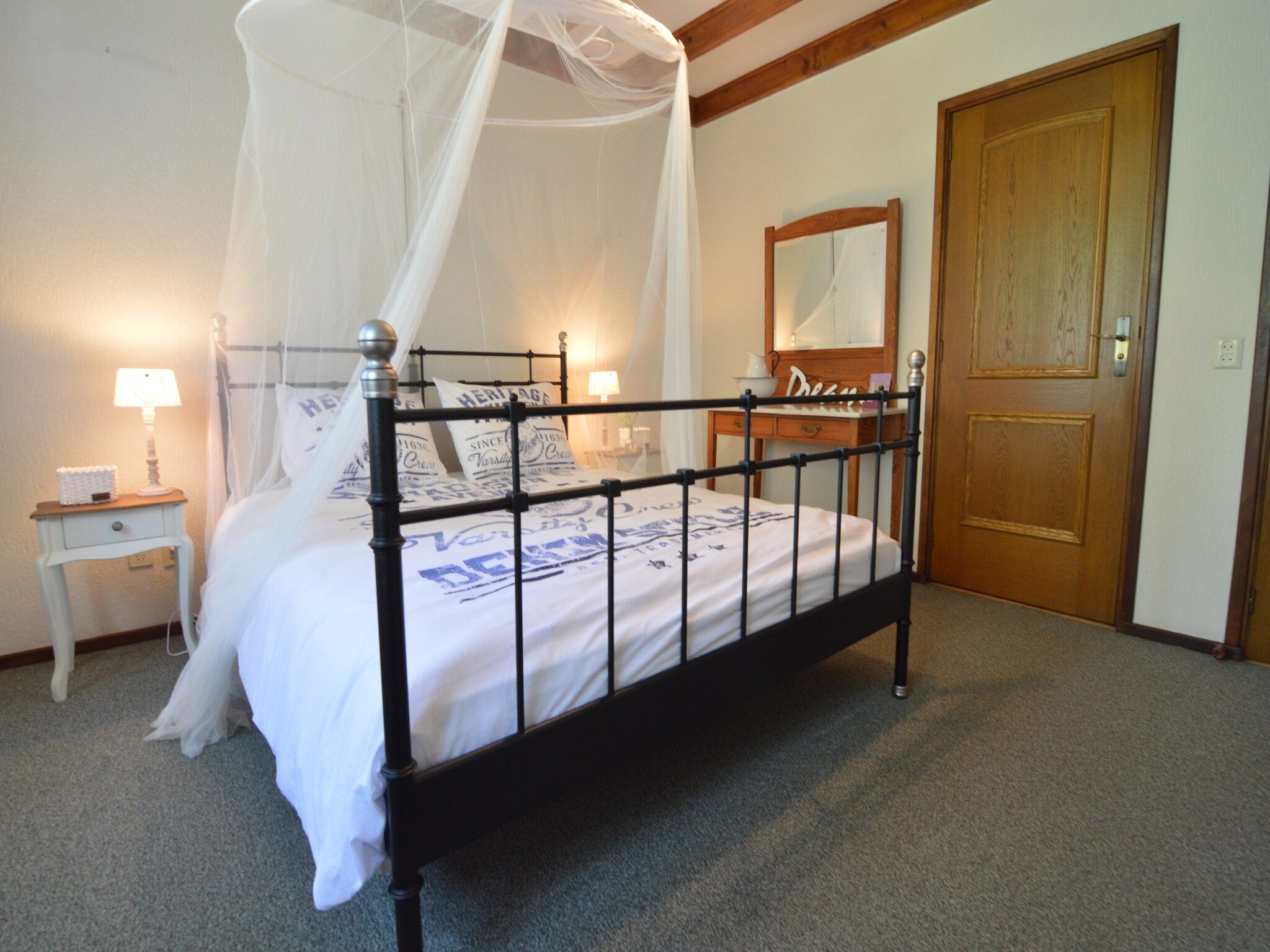 Een slaapkamer van Little White Cottage in Nijeberkoop