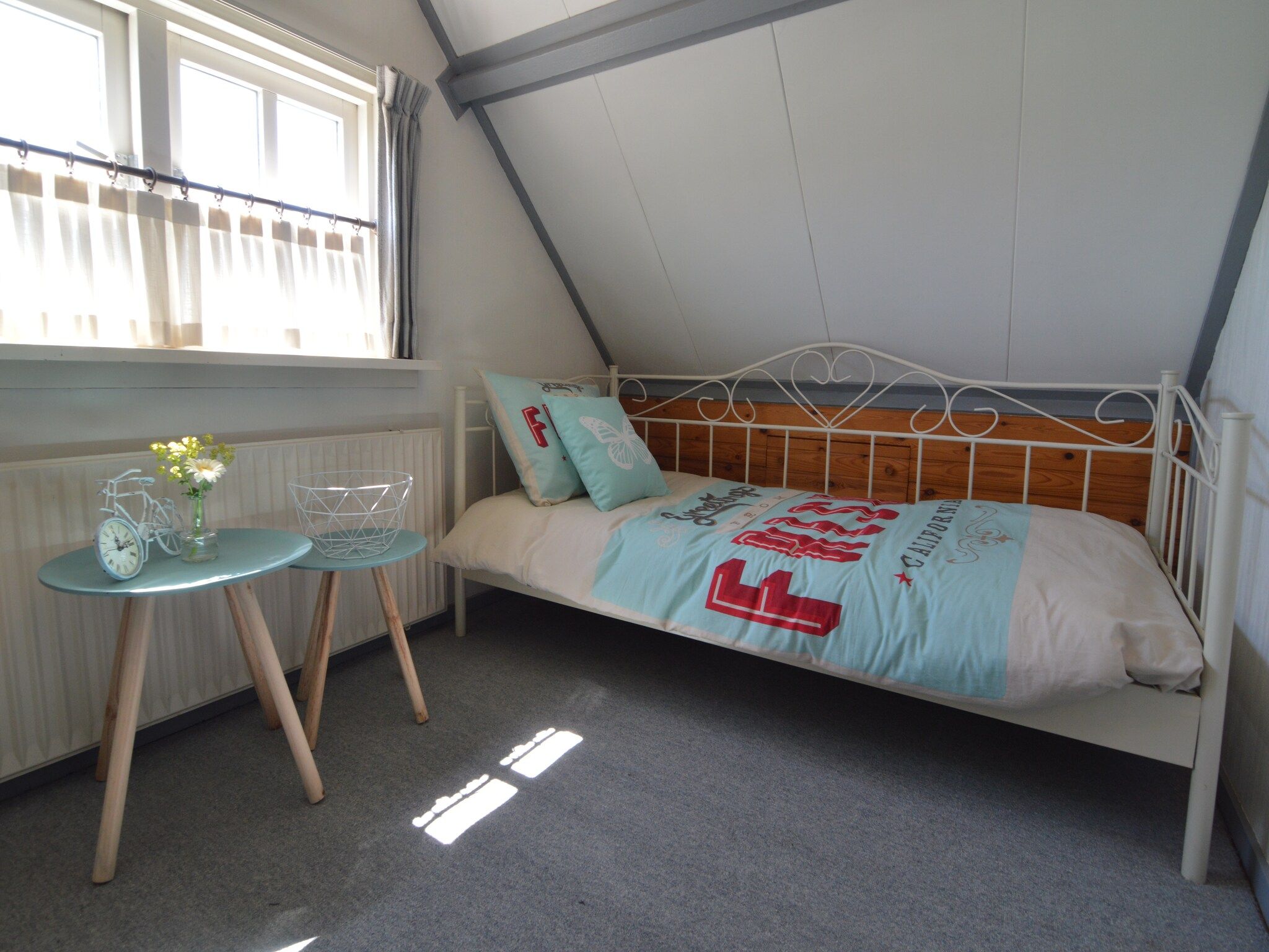 Een slaapkamer van Little White Cottage in Nijeberkoop