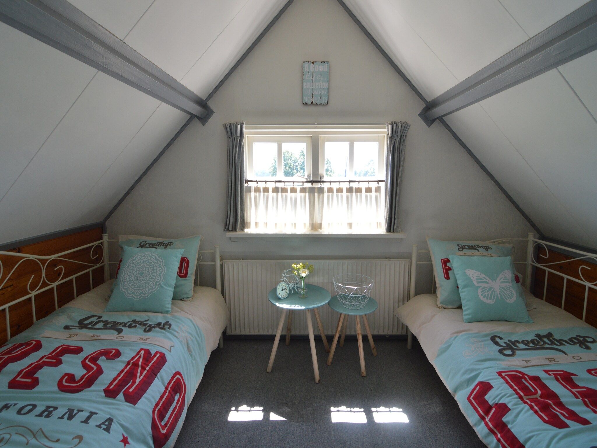 Een slaapkamer van Little White Cottage in Nijeberkoop