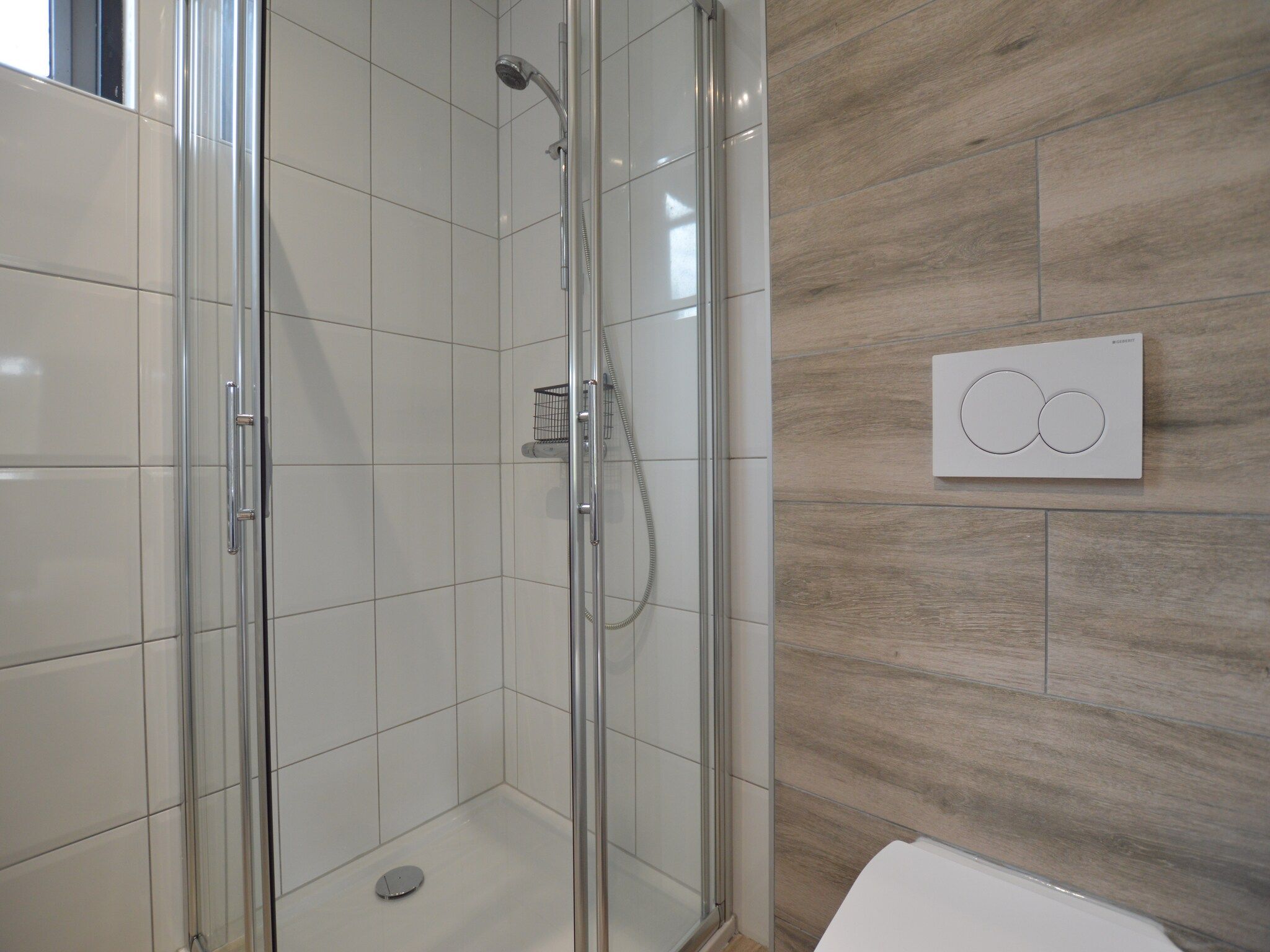 De badkamer van Bungalows 48 en 49 in Stramproy