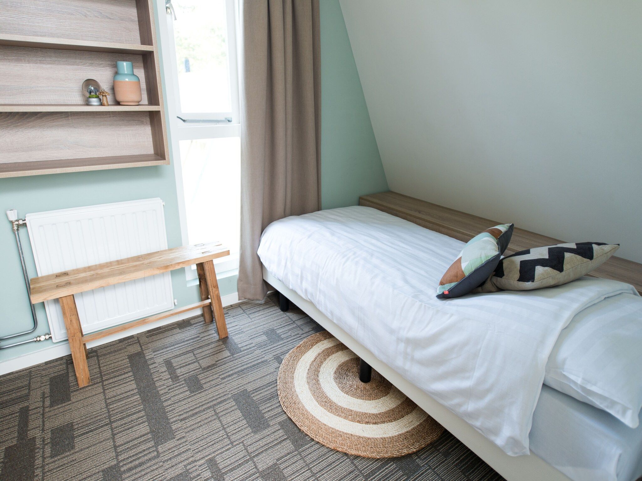 Een slaapkamer van Bungalowpark Hoenderloo 5 in Hoenderloo