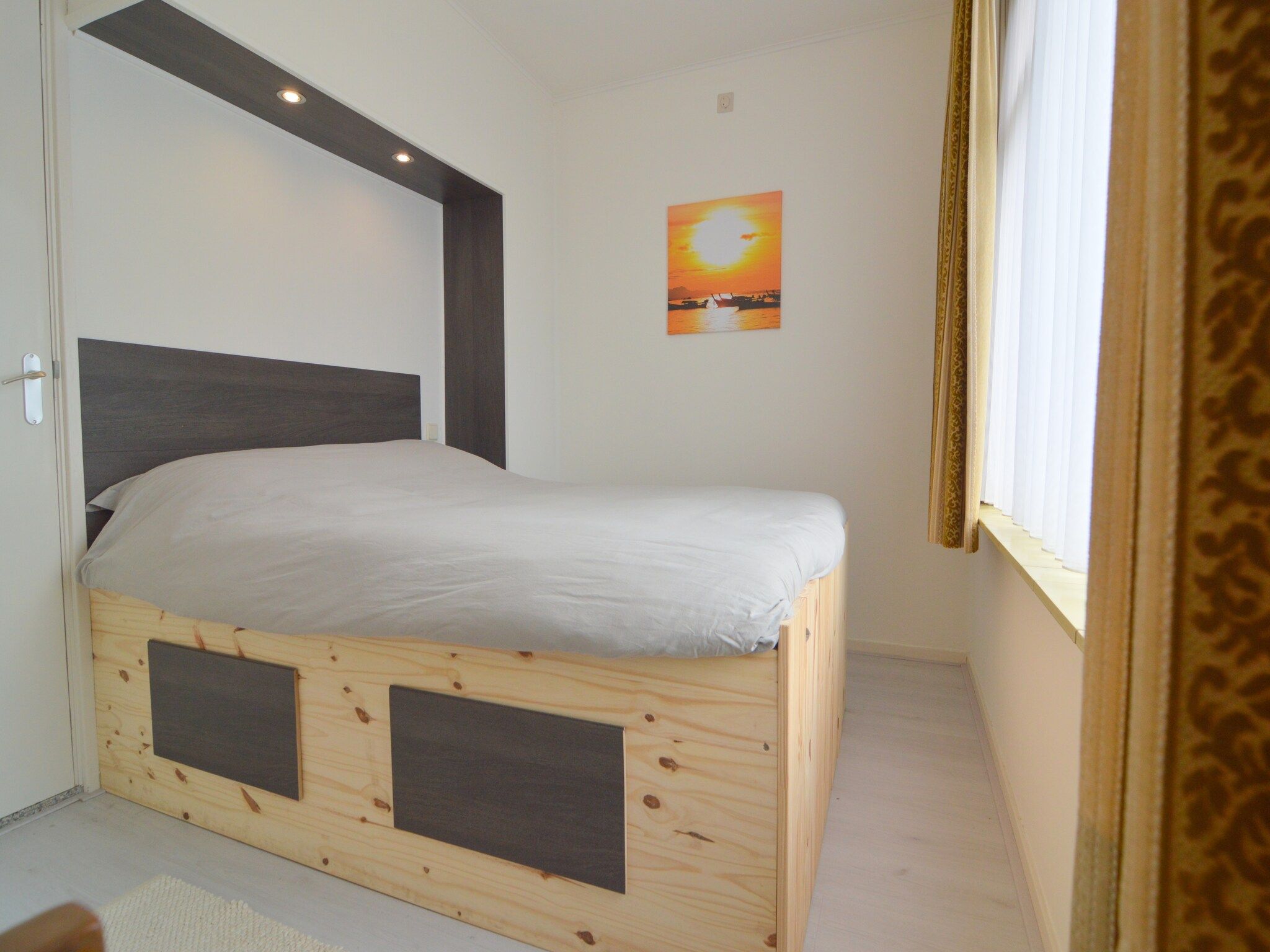 Een slaapkamer van Houck in Koewacht