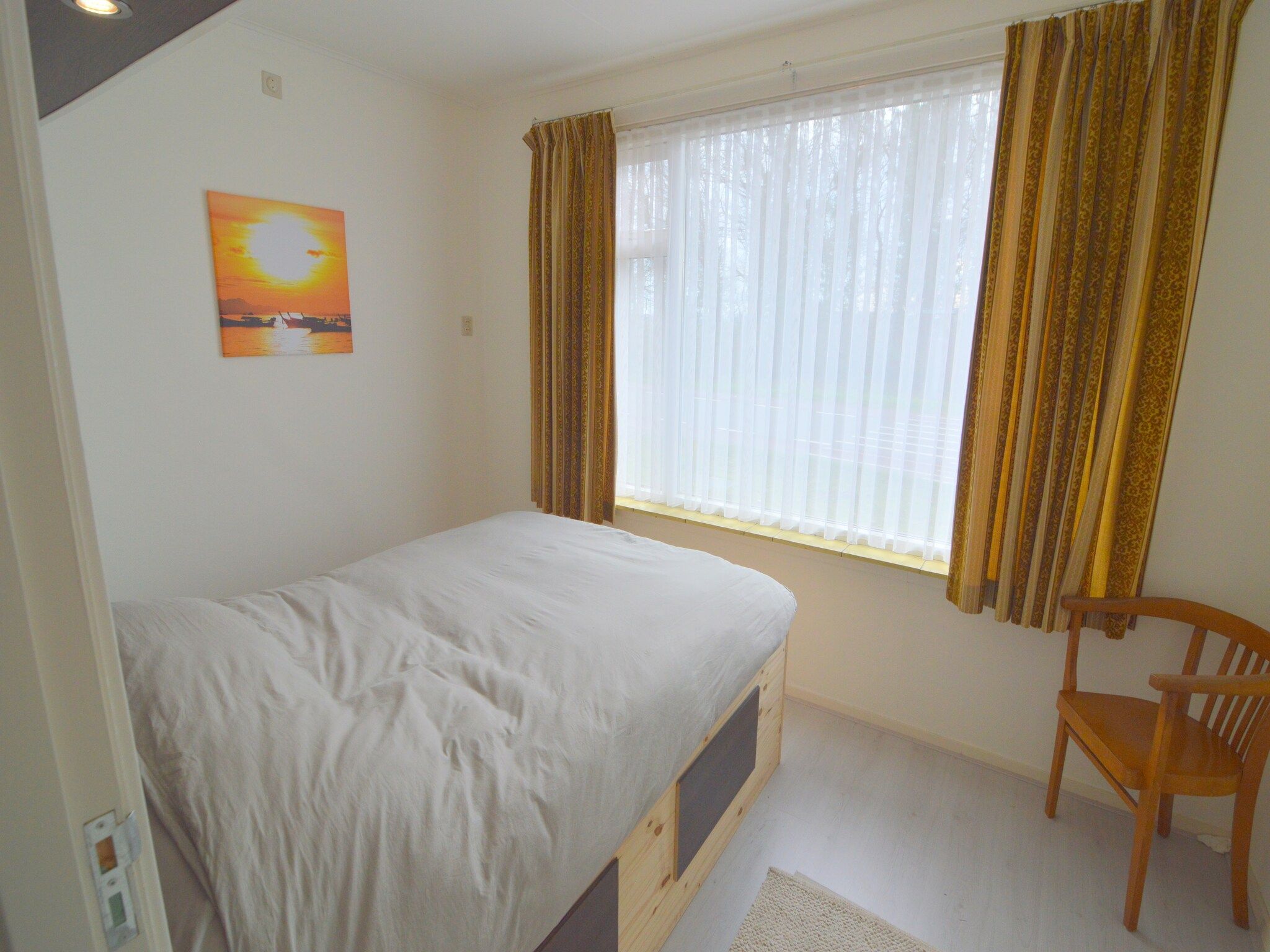 Een slaapkamer van Houck in Koewacht