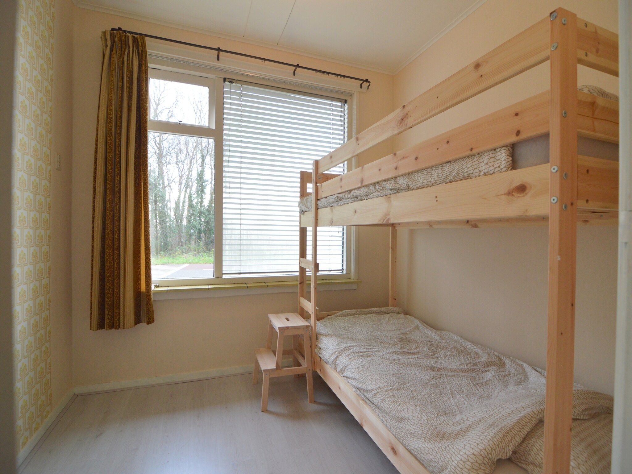 Een slaapkamer van Houck in Koewacht