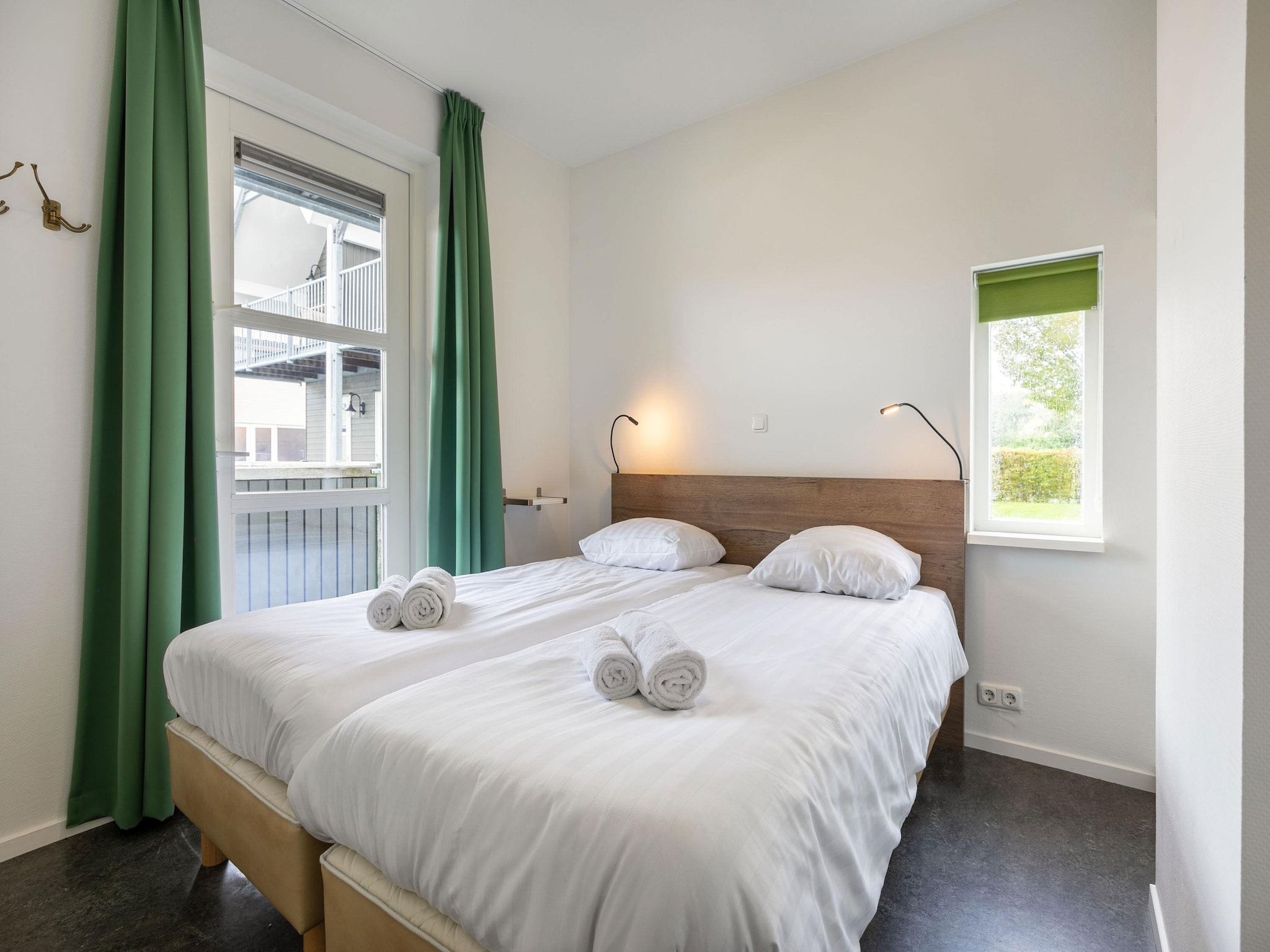 Een slaapkamer van Havenresort Terherne 1 in Terherne