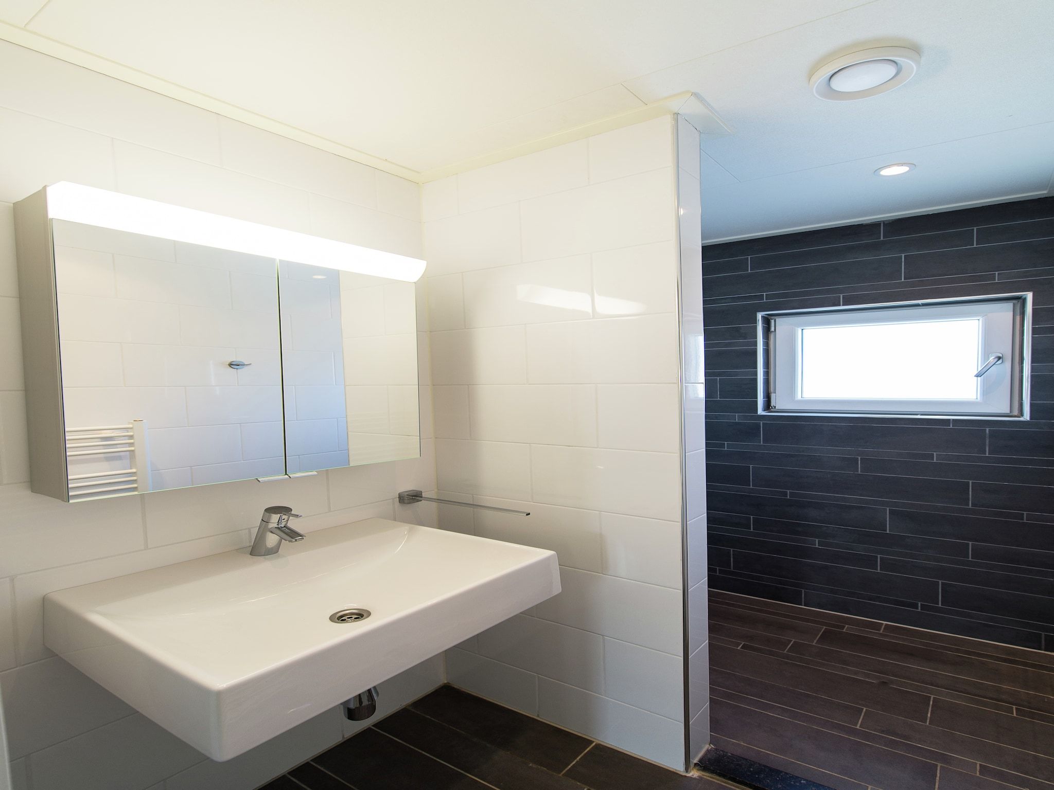 De badkamer van Vakantiepark Boomhiemke 5 in Hollum-Ameland