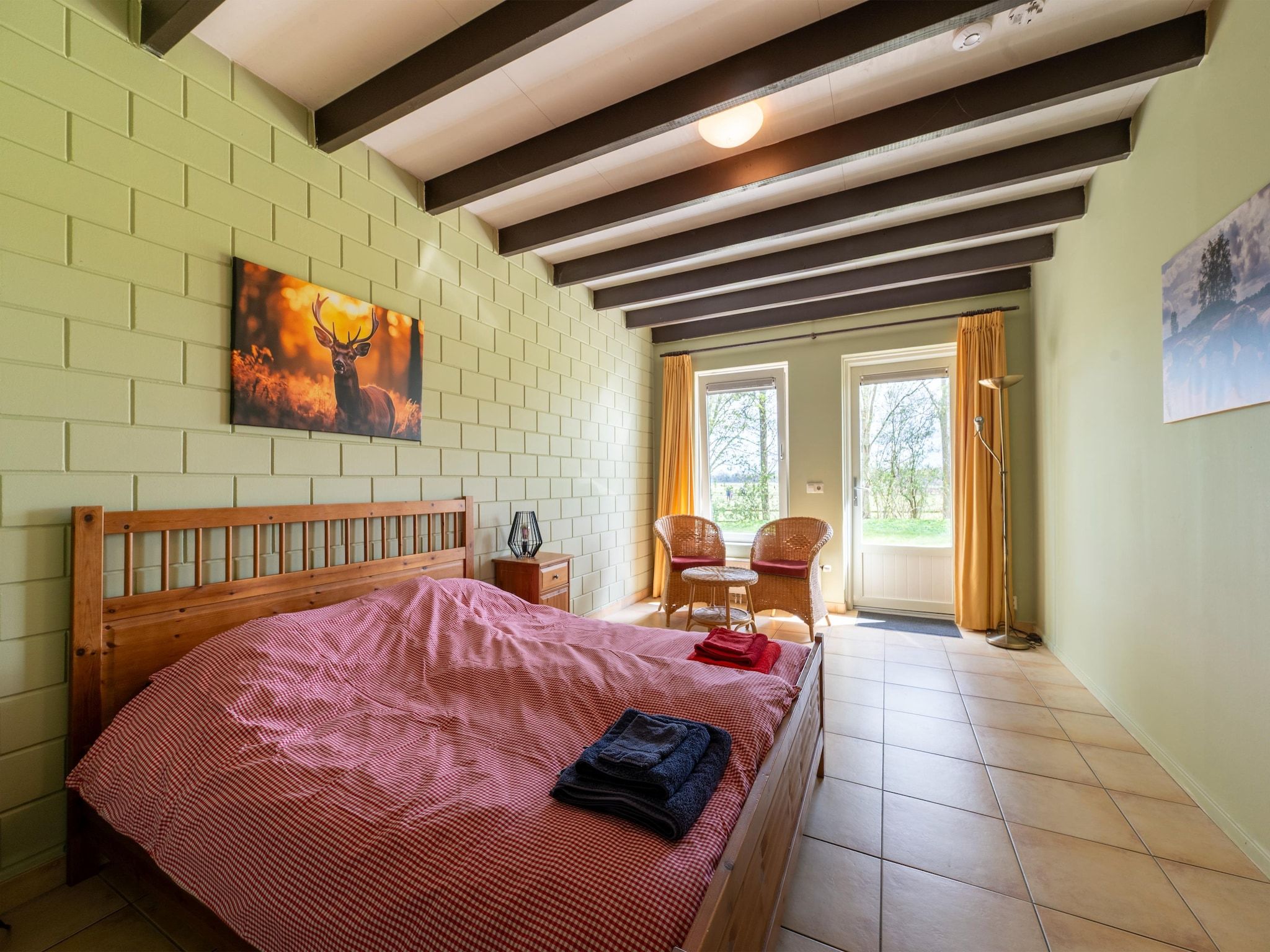 Een slaapkamer van De Kibbelhoeve in Kibbelveen