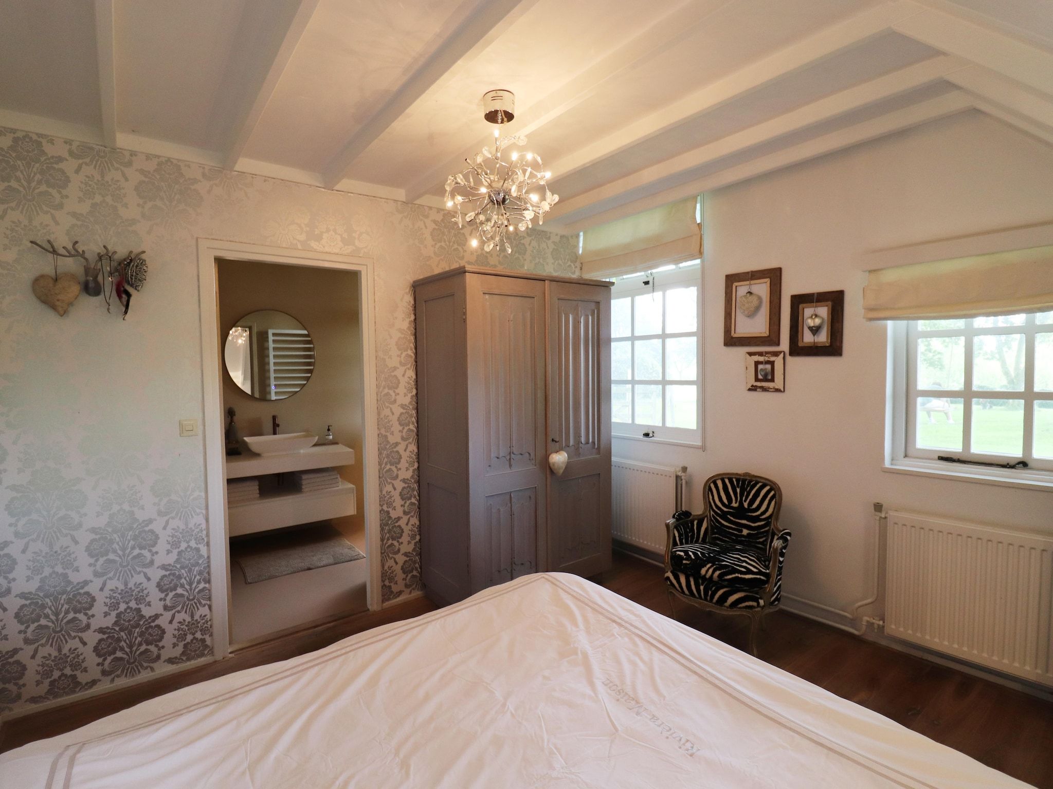 Een slaapkamer van Landgoed de Klimberg in Rheezerveen