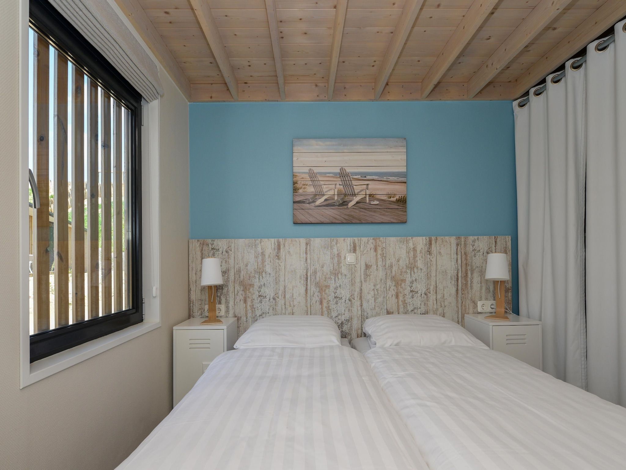 Een slaapkamer van Sea Lodges Bloemendaal 5 in Bloemendaal
