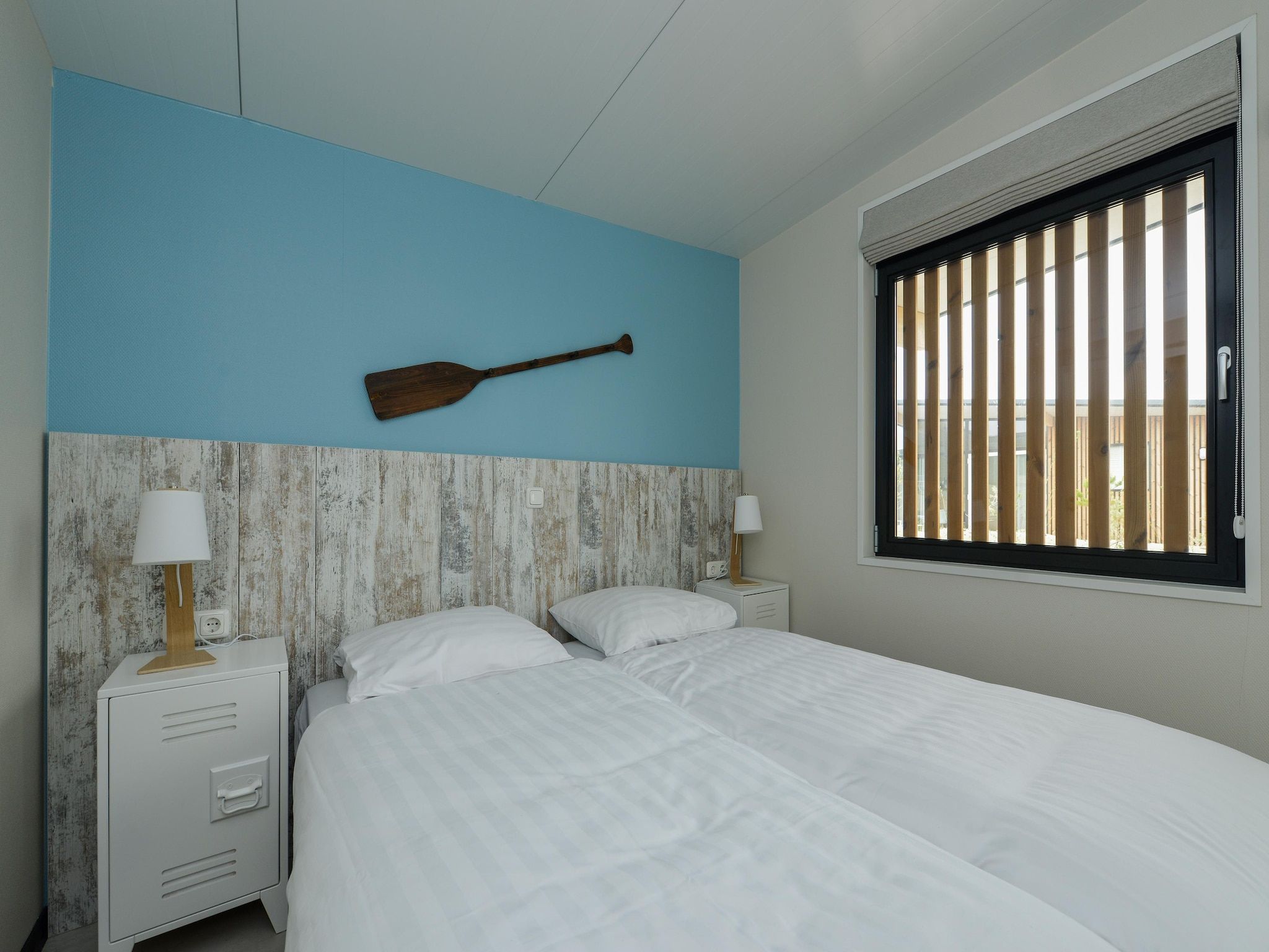 Een slaapkamer van Sea Lodges Bloemendaal 4 in Bloemendaal