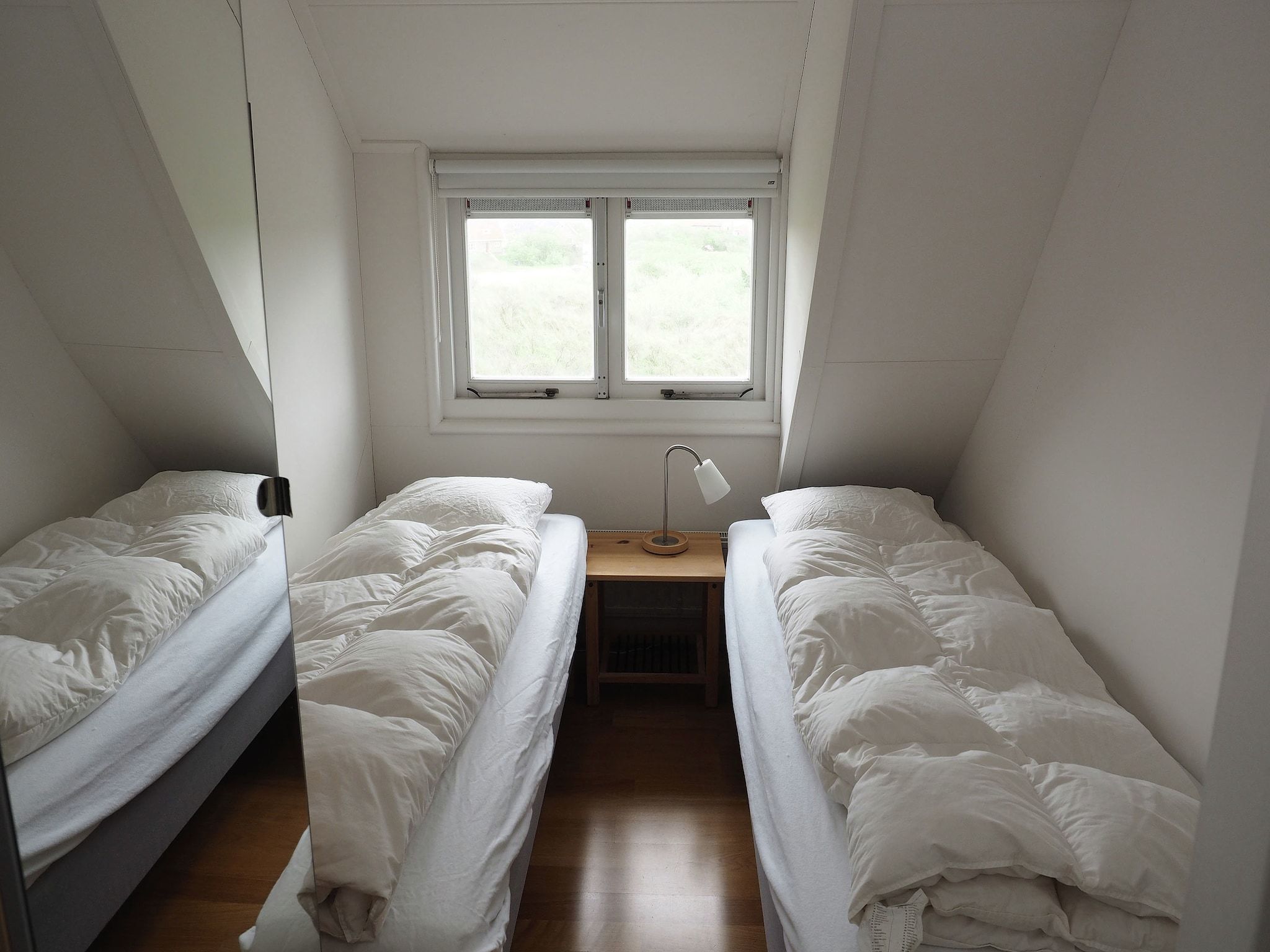 Een slaapkamer van Duindroom op Terschelling in Midsland Terschelling