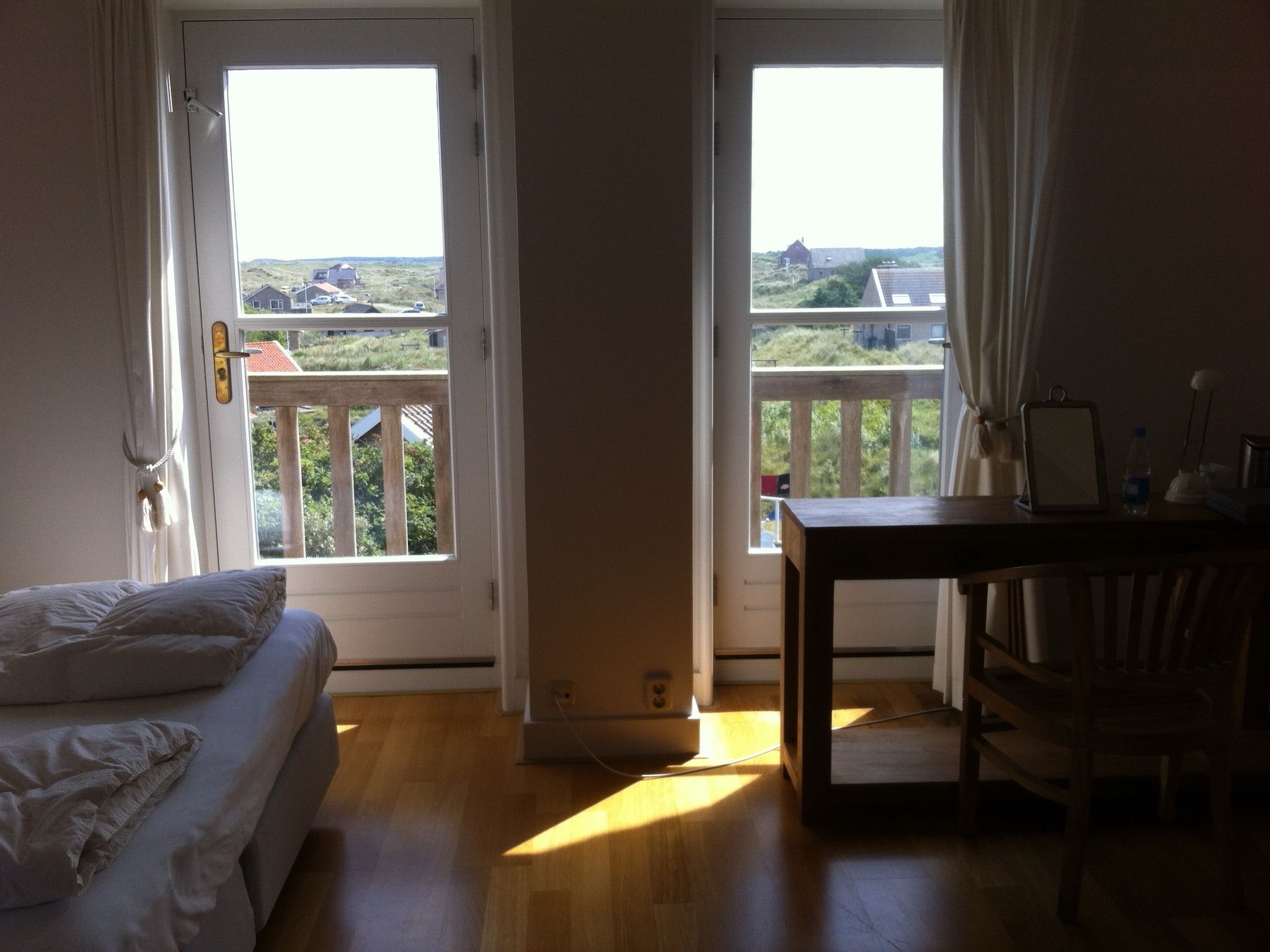 Een slaapkamer van Duindroom op Terschelling in Midsland Terschelling