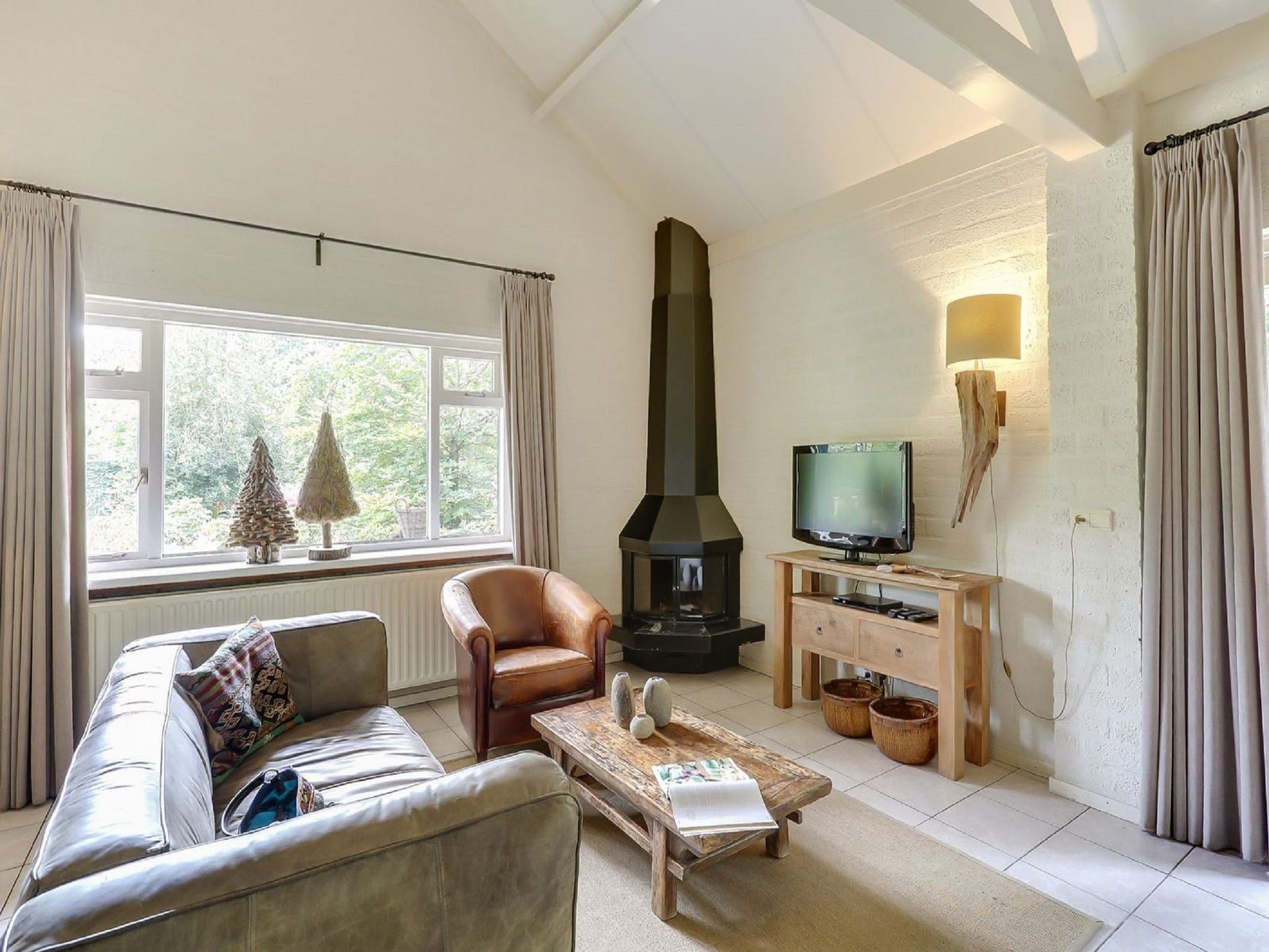 De woonkamer van Vakantiepark Sandberghe 3 in Uden