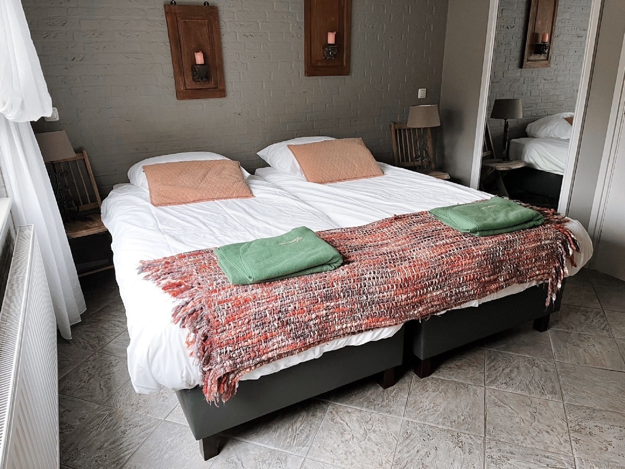 Een slaapkamer van Vakantiepark Sandberghe 5 in Uden