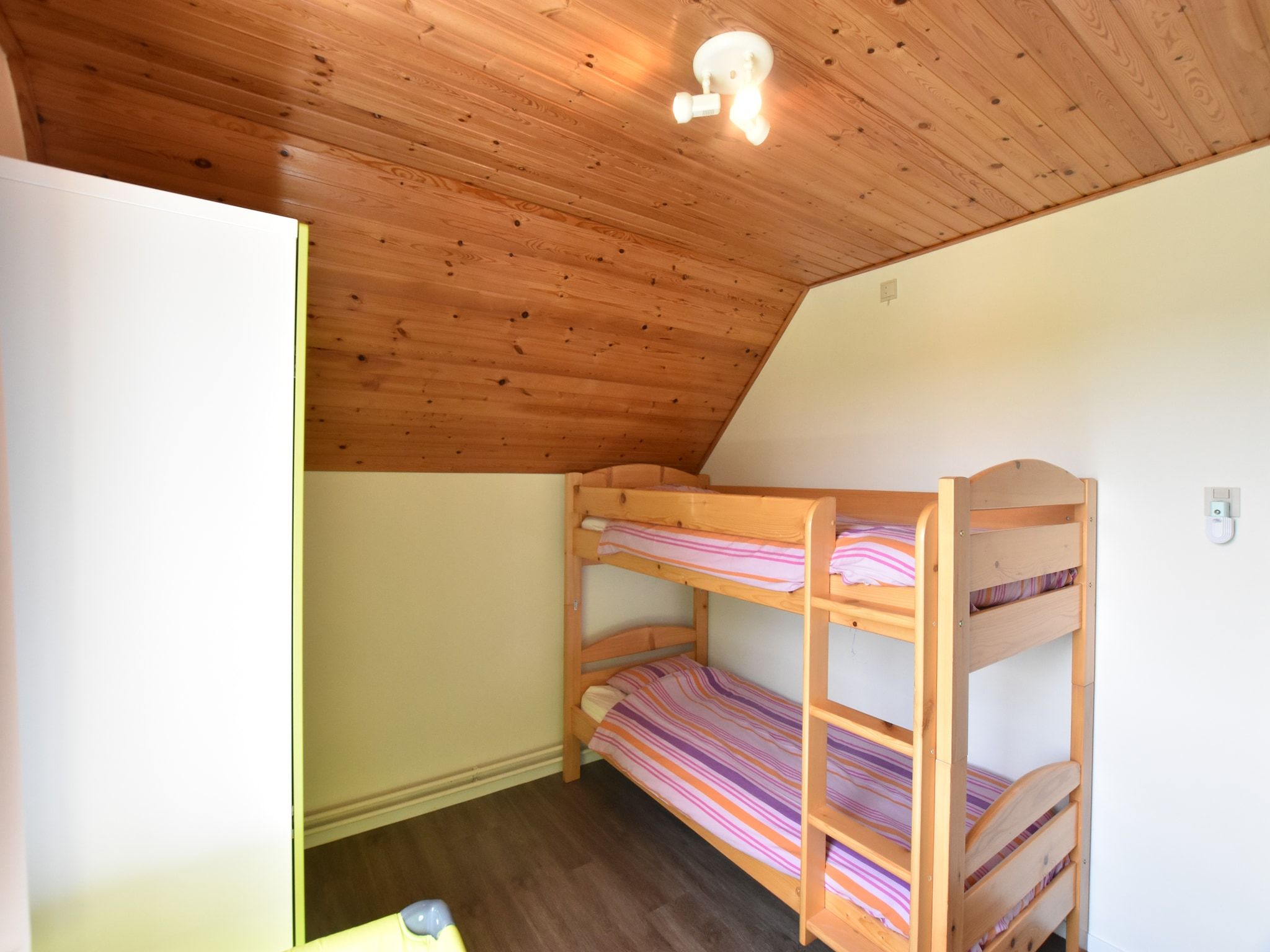 Een slaapkamer van De Biezenknop in Eede