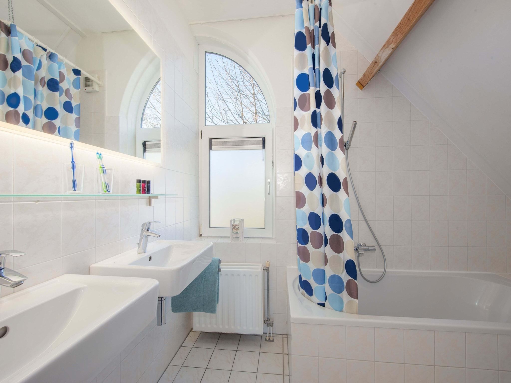 De badkamer van Noordzee Résidence De Banjaard 8 in Kamperland