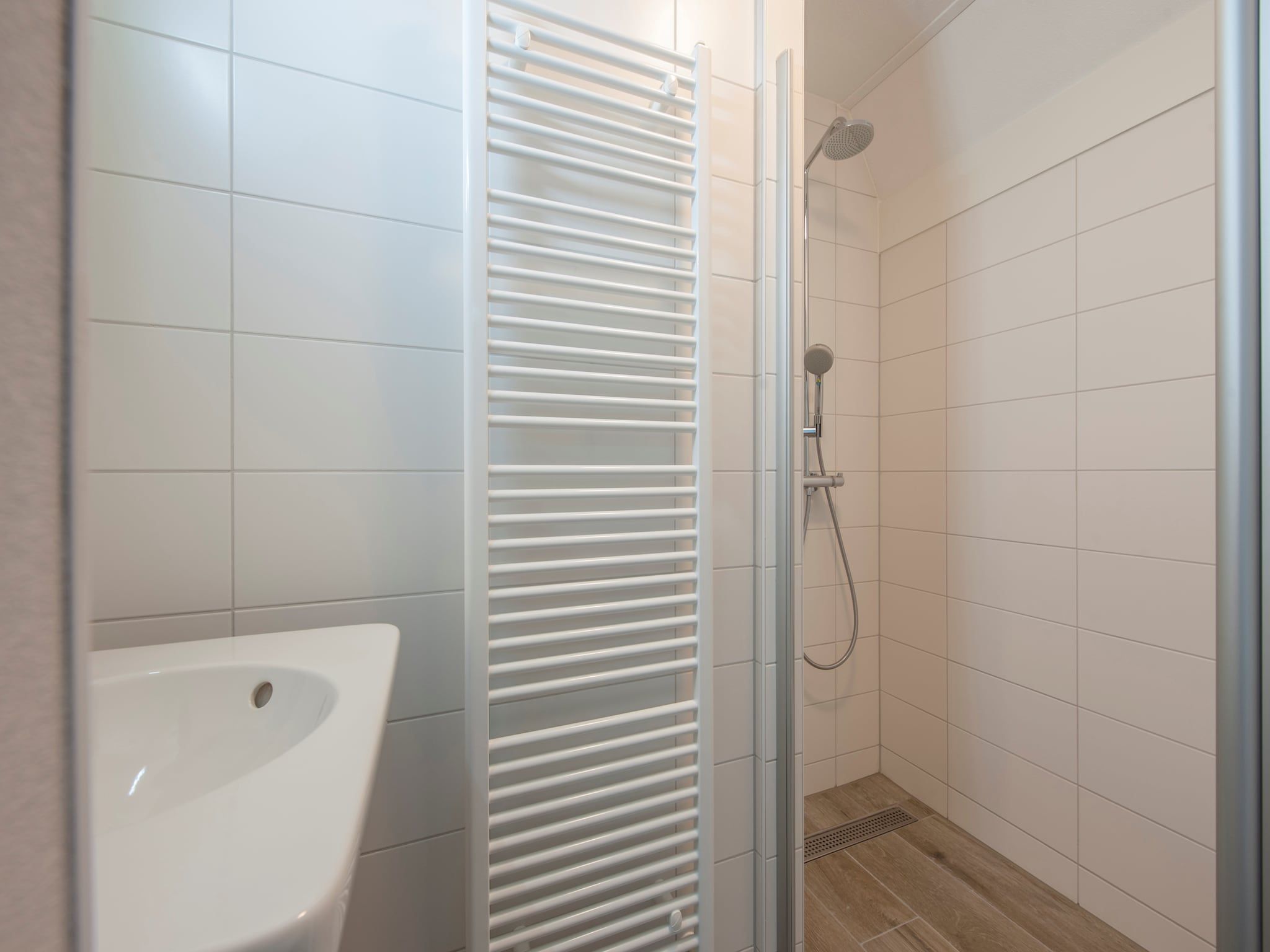 De badkamer van Noordzee Résidence Dishoek 11 in Koudekerke