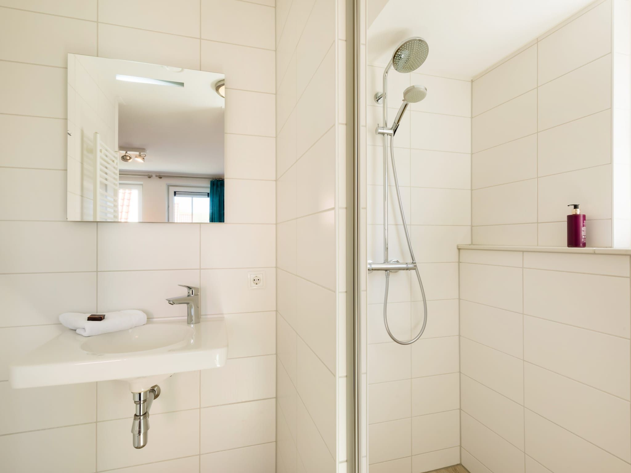 De badkamer van Noordzee Résidence Dishoek 2 in Koudekerke