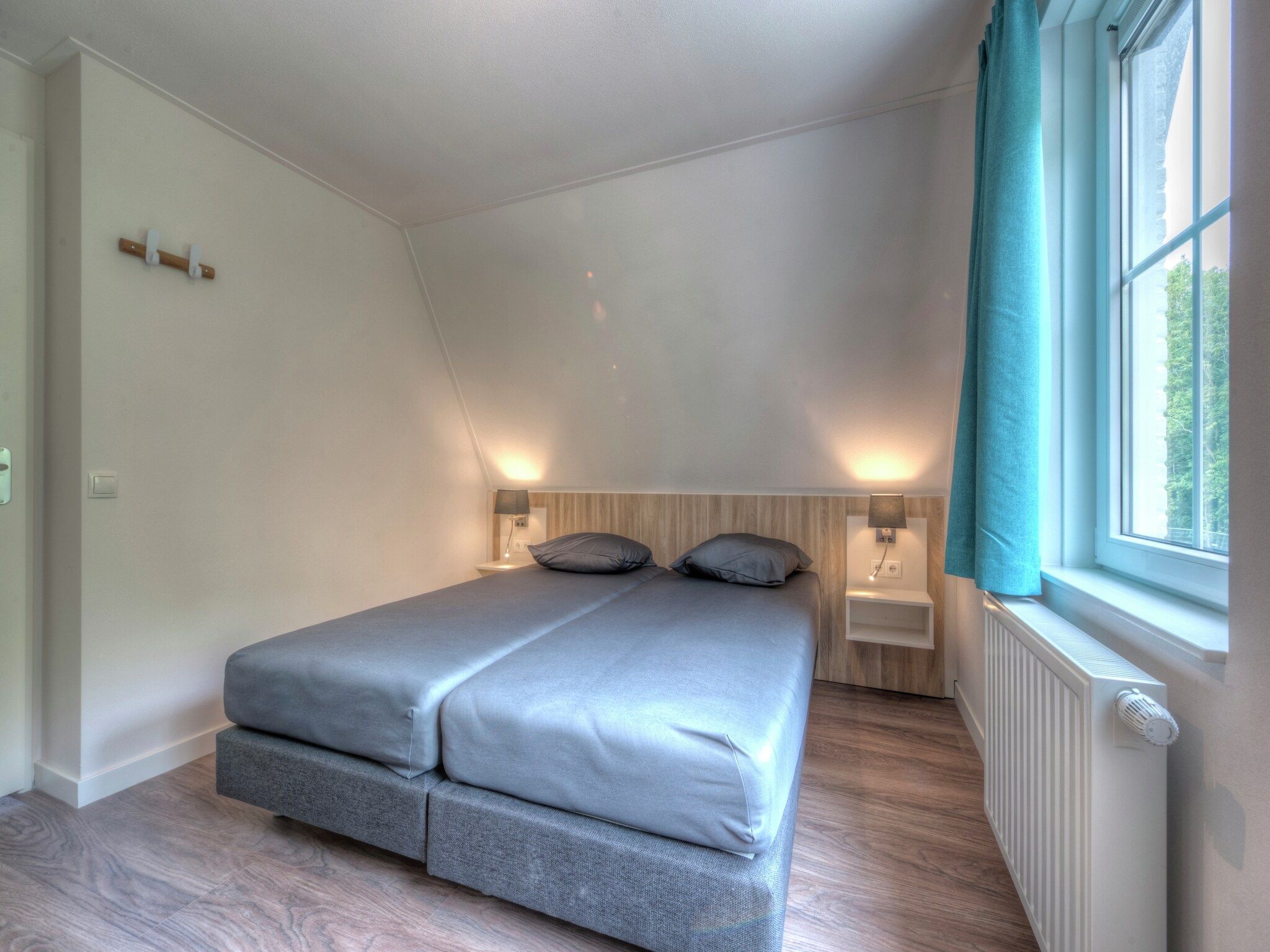 Een slaapkamer van Noordzee Résidence Dishoek 9 in Koudekerke