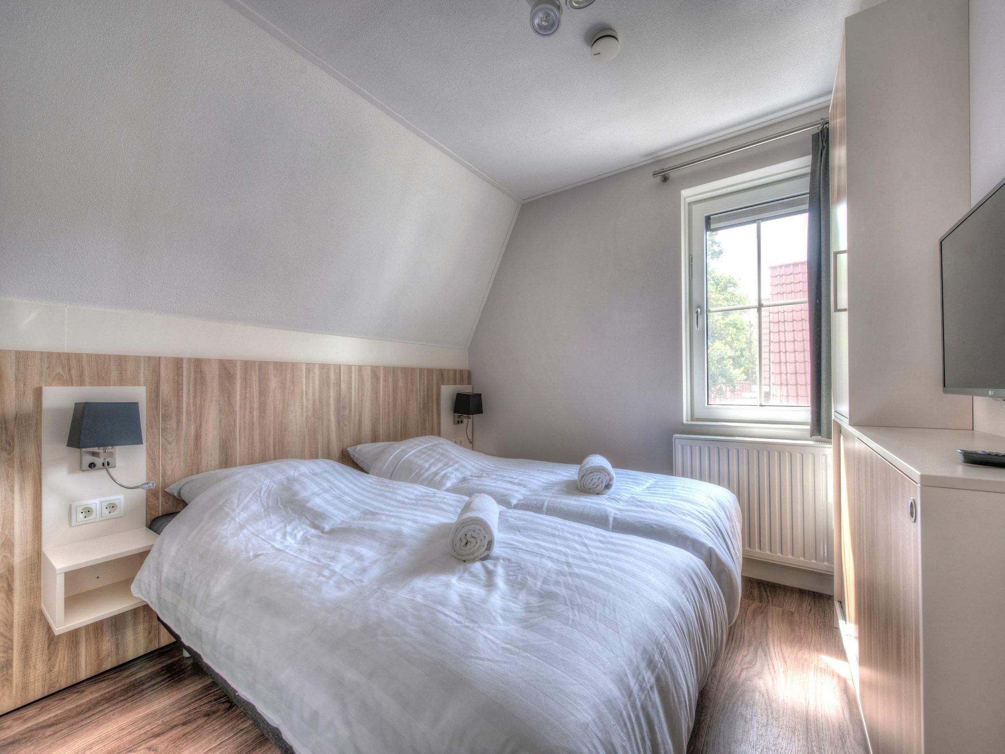 Een slaapkamer van Noordzee Résidence Dishoek 8 in Koudekerke