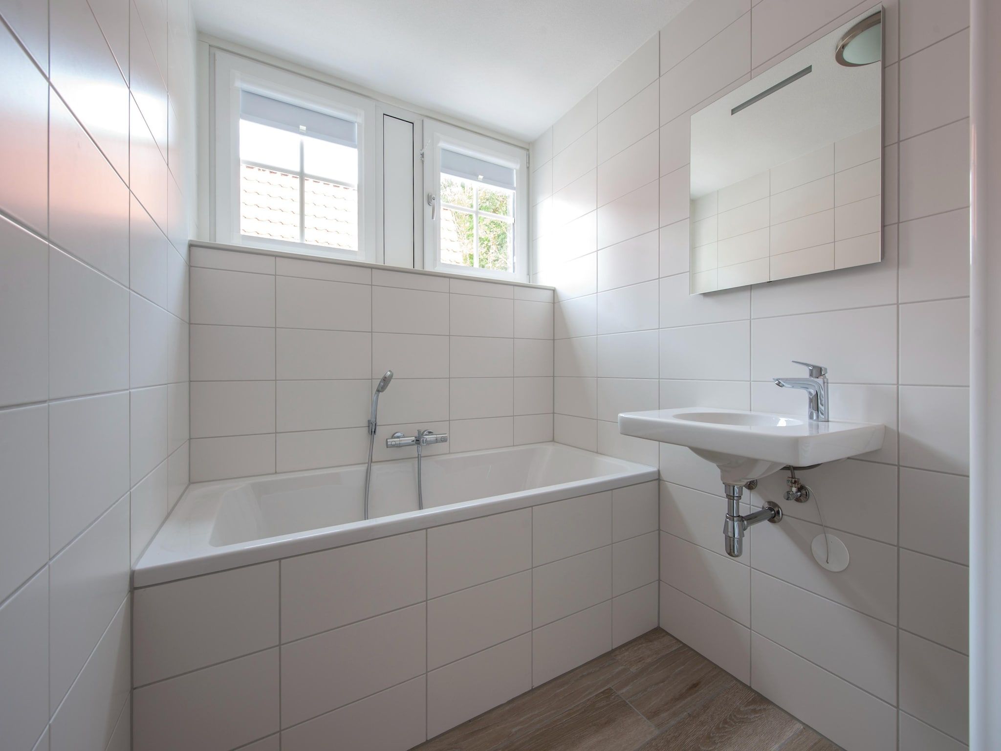 De badkamer van Noordzee Résidence Dishoek 8 in Koudekerke