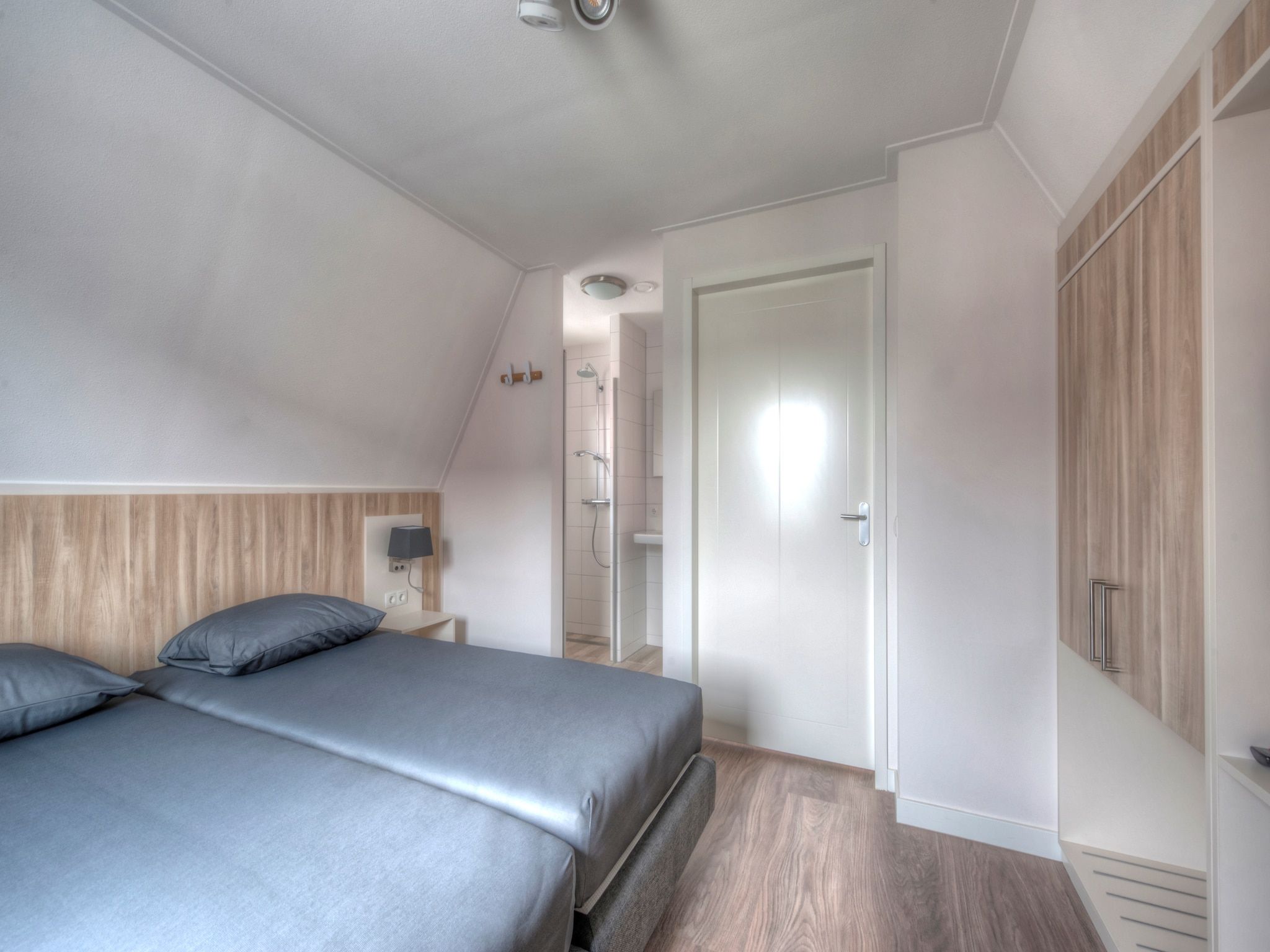 Een slaapkamer van Noordzee Résidence Dishoek 3 in Koudekerke