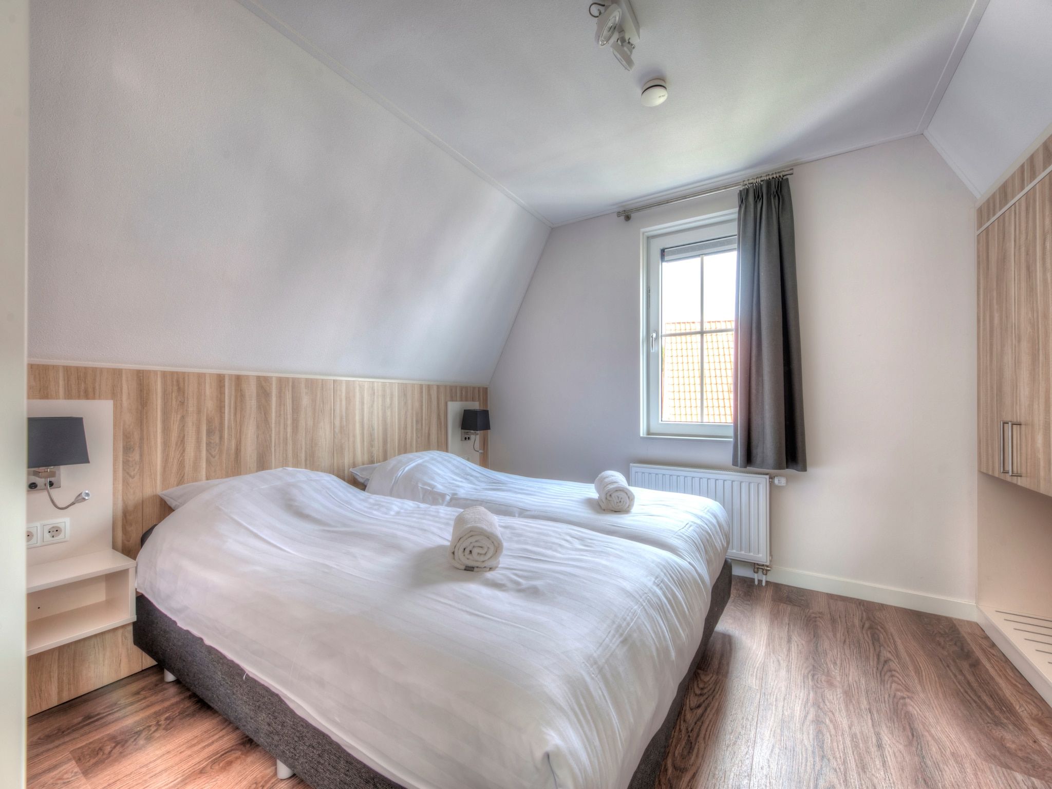 Een slaapkamer van Noordzee Résidence Dishoek 3 in Koudekerke