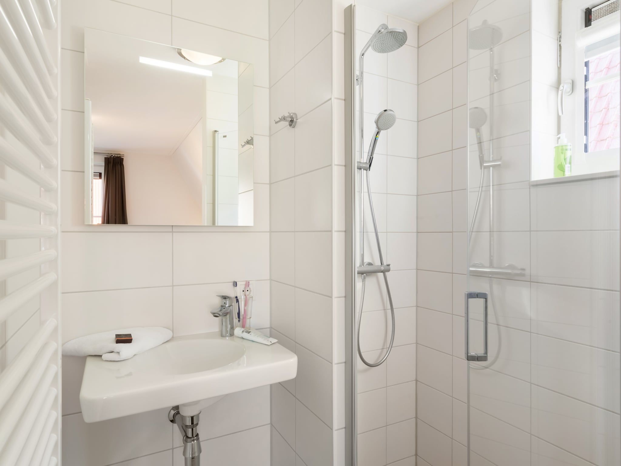 De badkamer van Noordzee Résidence Dishoek 3 in Koudekerke