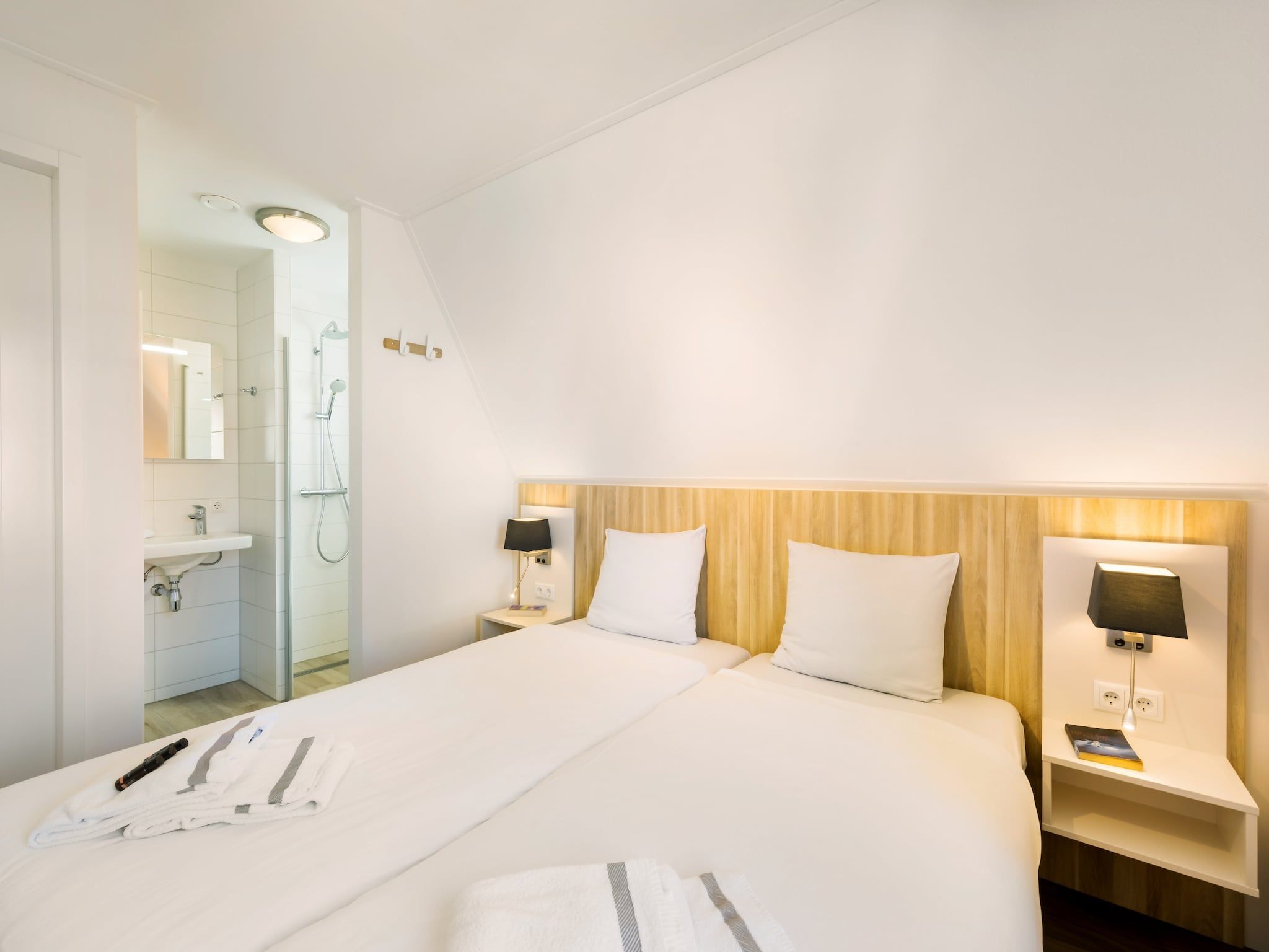 Een slaapkamer van Noordzee Résidence Dishoek 3 in Koudekerke