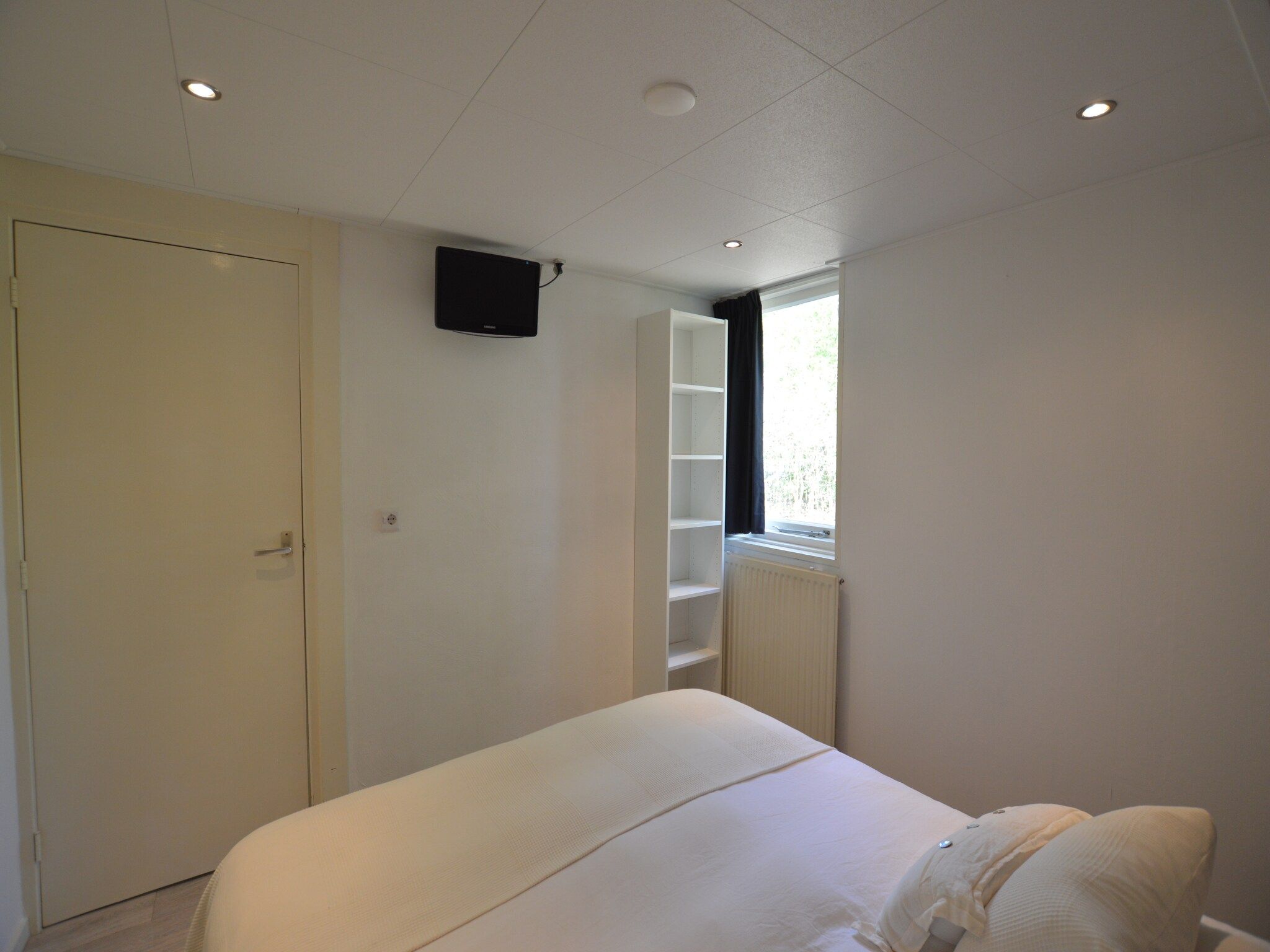 Een slaapkamer van Het Kleine Landgoed in Stramproy