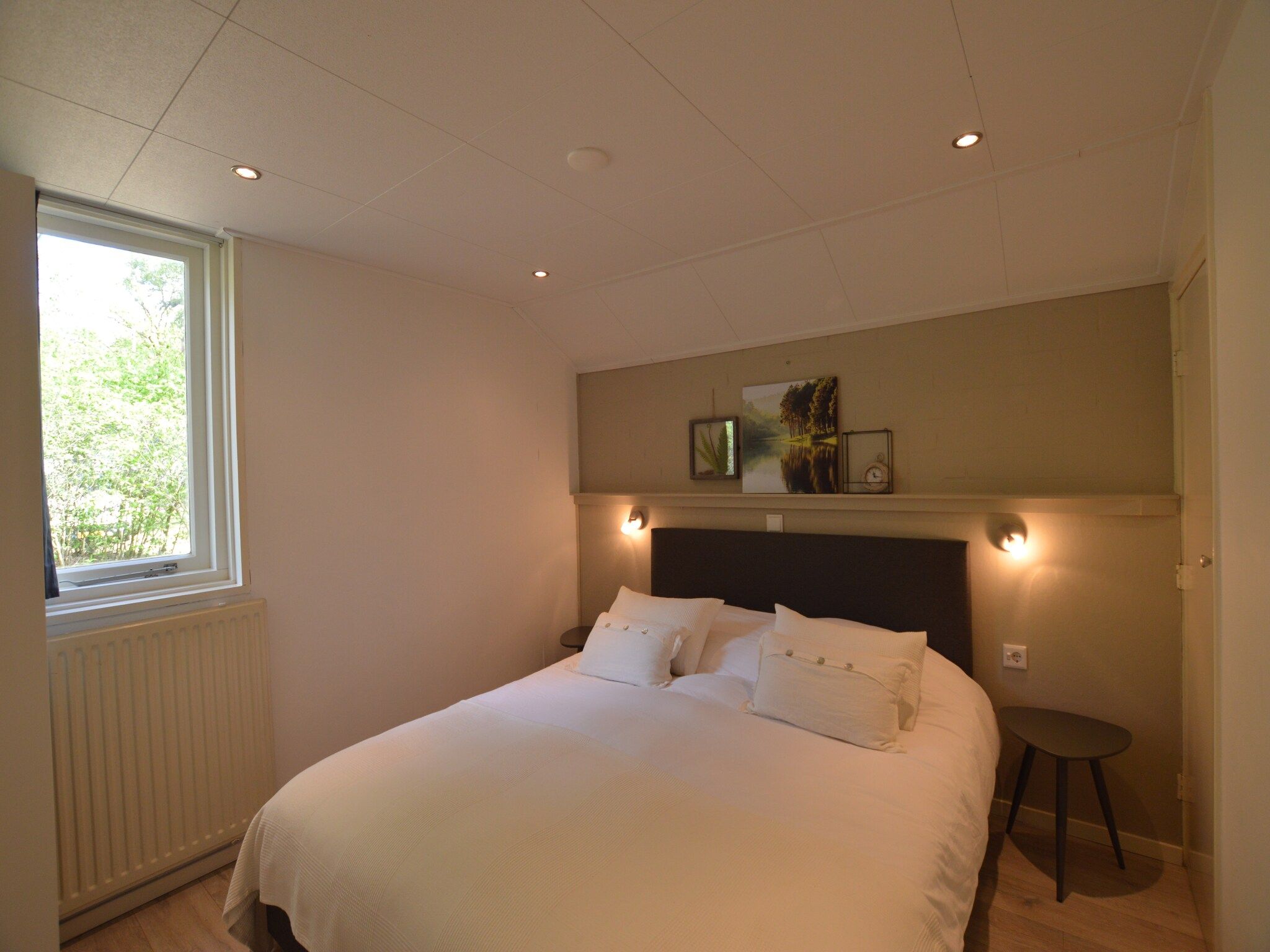 Een slaapkamer van Het Kleine Landgoed in Stramproy