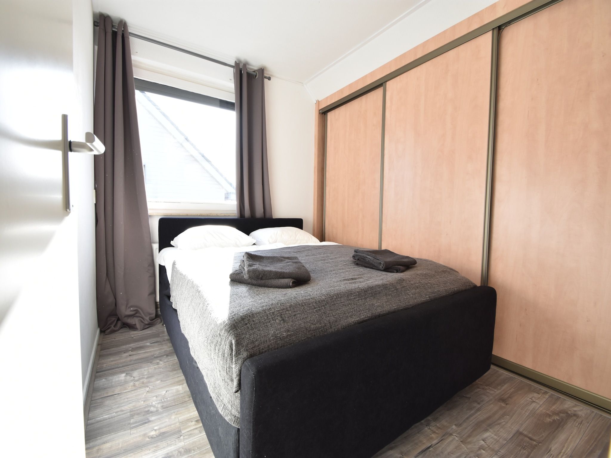 Een slaapkamer van Het Mosselhuys in Bruinisse